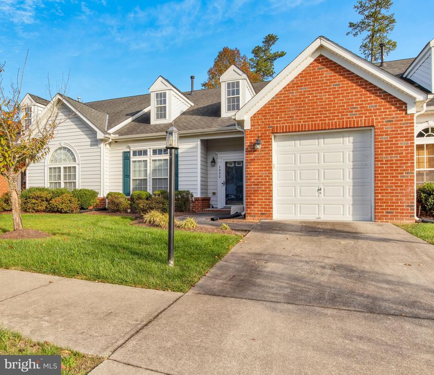 Welcome home to this extremely well cared for townhome in The Villages at the Crossings featuring entry level living. The HOA enhances your lifestyle by managing all exterior maintenance, from lawn care to major updates like the roof replacement, completed in 2024. Step inside and be captivated by the thoughtful layout with soaring vaulted ceilings and an abundance of natural light. The first level boasts stunning hardwood floors, elegant chair and frame molding, and a cozy double-sided gas fireplace. The gourmet kitchen is a chef’s dream, complete with granite countertops, stainless steel appliances, a breakfast bar, and a spacious dining area. The main-level primary suite is a true retreat, showcasing a tray ceiling, a walk-in closet, and a luxurious ensuite with a walk-in shower. Upstairs, you'll discover a versatile open loft space, a full bathroom, and two additional bedrooms. One bedroom is equipped with surround sound, and both feature walk-in closets. Outside, relax on the patio and enjoy your fenced-in and maintained backyard! Situated near a serene golf course with no through traffic, this home offers the perfect blend of tranquility and convenience, close to schools, shopping, and major highways. Don’t miss the opportunity to make this exceptional home yours—schedule your showing today!