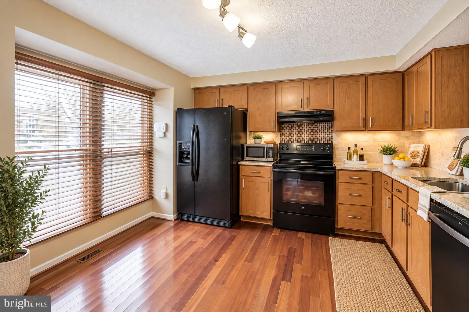 6121 CEDAR WOOD DRIVE