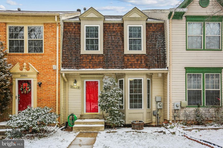 Nature abounds around this beautifully updated 3 Bedroom, 2 full & 2 half Bath townhouse backing to woods and Little Seneca Creek in a prime location at the Waters Landing community of Germantown. It has all been done for you and the home is in move-in condition: new neutral paint palette throughout, hardwood flooring on the main and upper level. The main level featurs an entrance foyer, remodeled kitchen with light wood cabinets, granite countertops, stainless steel appliances, wood flooring, and a large bay window. The bright and sunny living room/dining room combination offers wood flooring, two windows, a newer sliding glass door to a large deck and overlooks parkland and the creek. On the upper level you find the primary bedroom with wood flooring, two large closets and an updated en-suite bathroom with a tub and separate shower. Two additonal bedrooms with wood flooring and spacious closets, an updated hall bath with tub, and a linen closet provide ample living space. The walk-out lower level offers a large recreation room with  vinyl plank flooring, a wood burning fireplace, a full size window and a newer sliding glass door to the patio. A half bath plus a generously sized laundry room with ample storage space, a utility room with the furnace and water heater complete this level. The roof, gutters with gutter covers, windows, sliding glass doors approx. eight years old; new  AC unit in 2016. The Waters Landing community offers an abundance of amenities, among them playgrounds, outdoor pools, several miles of trails and bike paths, tennis courts, a community center & much more. The home is within easy access to I-270 an other commuter routes, shopping, dining and recreational facilities, including Black Hill Regional Park; MARC train service is approximately one mile away.