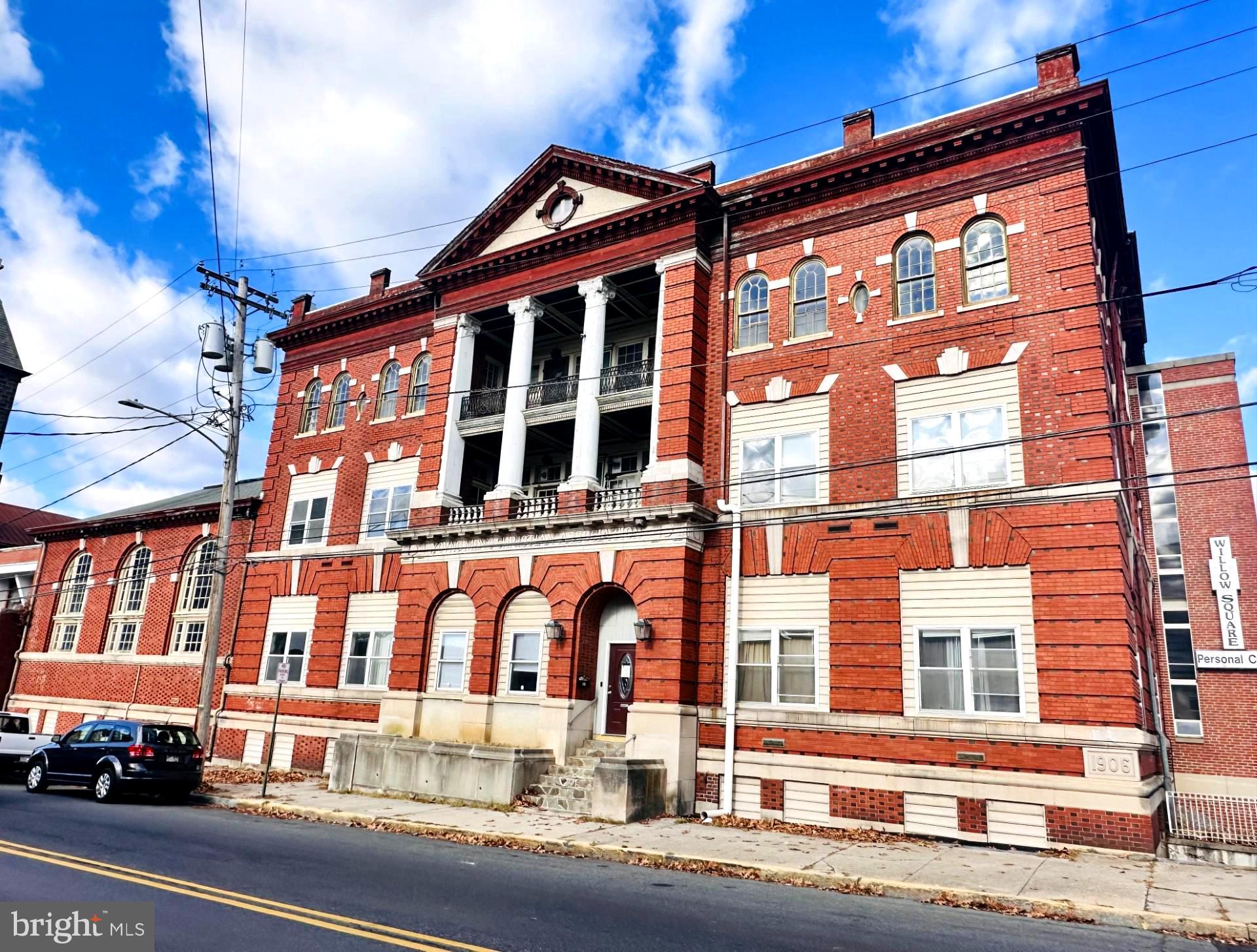 See the potential in this mixed use commercial building! 4 floors, multiple entrances, and a great location, This property features lots of unique spaces that could facilitate many types of businesses. Includes