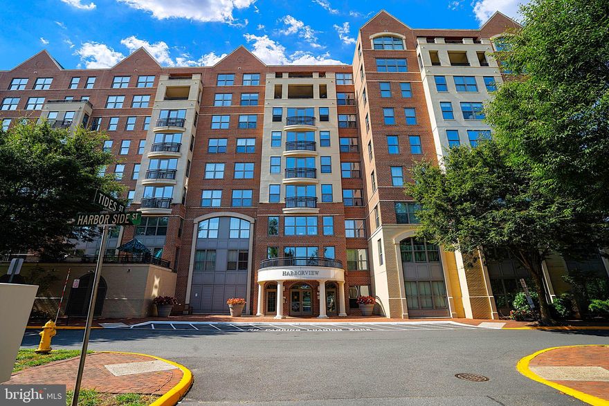 A great lifestyle awaits!  Welcome to this beautiful waterfront community and a spacious 2-bedroom, 2-bathroom condo located in  Harbor View Condominiums at Belmont Bay, near the peaceful Occoquan Bay National Wildlife Refuge.  Nestled on the top third of the building, this condo offers breathtaking views of the surrounding woods, providing a serene and private retreat.

The interior is immaculate, with an open floor plan that maximizes both space and light. The kitchen has been upgraded to include granite countertops, 42-inch cabinets, stainless steel appliances, and a convenient breakfast bar, making it perfect for cooking and entertaining. Just off the kitchen is a large family room, complete with luxury vinyl plank flooring and a cozy fireplace. The adjacent sunroom is a wonderful spot to relax and enjoy the beautiful views or set it up for an office with peaceful views. There is also a separate den that can be used as a dining room or transformed into a home office as well.

The luxurious master suite is a true retreat, featuring a spacious walk-in closet and an en-suite bathroom with dual vanities, a soaking tub, and a separate shower. The second bedroom is also generously sized, and there is an in-unit laundry room for added convenience.

Living in Harbor View Condominiums means access to a wealth of amenities and concierge service.  The building also offers secure, controlled entry and on-site management. The building features an outdoor swimming pool, a fitness center, and a community room with a kitchen and deck, perfect for gatherings.  For those who love the water, the marina is just a short walk away, with boat slips available or the option to join the local boat club.

The location is ideal for commuters, with easy access to the VRE, Fort Belvoir, I-95, and major destinations like Washington, DC, the Pentagon, and Quantico. You’ll also find local shops, a coffee shop, and golf courses just minutes away.

With its luxurious finishes, spacious layout, and unbeatable location, this condo offers a perfect balance of comfort, convenience, and natural beauty. Schedule a viewing today to experience all that this exceptional home has to offer.

Harbor View Condominium and HOA includes:  
The ONLY Condo in Belmont Bay with its own on-site HOA Manager 
On-site maintenance and housekeeping attendant 
Private swimming pool with Lifeguard 
Private fitness center with private bathroom and shower 
Private community room with a kitchen and deck 
Private tennis courts 
Secure, controlled entry 
Secure, controlled garage 
1-minute walk to Belmont Bay Marina, Belmont Bay Paddle Club, and the Freedom Boat Club 
1-minute walk to the Belmont Bay restaurant and shops 
5-minute walk to the National Wildlife Refuge 
10-minute walk to VRE station. 
5-minute drive to the Hwy 95 EZPASS 
5-minute drive to Route 123 
11-mile drive to Franconia-Springfield Metro Station 
 
Belmont Bay HOA (BBHOA) includes
Summer Concerts at the Belmont Bay Marina 
Community swimming pool 
Community tennis courts 
Community children's play area 
Community walking paths on golf cart paths from the old Osprey golf course 
HOA maintains the old Osprey golf course so the Belmont Bay community can enjoy it year around.