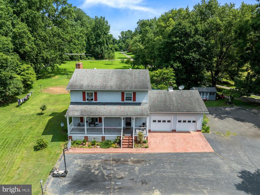 Opportunity awaits! This two-story colonial is full of potential and ready for your imagination and ideas. Nestled on 4.5 mostly cleared acres, this property offers the perfect blend of privacy, space, and convenience. The home features a traditional layout with plenty of room to customize and refresh. While it could use some TLC and cosmetic updating, it's a solid foundation for creating your dream home — bring your vision and make it your own! In addition to the attached 2-car garage, you'll find a massive detached barn/garage that's a true standout feature. Complete with finished floors, drywall, a separate office space, its own bathroom, and full length overhang, this space is ideal for mechanics, welders, hobbyists, or entrepreneurs looking to operate a business close to home. Whether you’re looking to run a shop, store equipment, or expand your workspace, this versatile structure offers endless possibilities. Out back, enjoy the fenced-in in-ground pool, perfect for summer relaxation and entertaining. With over 4 acres to spread out, there’s room for gardens, animals, or recreational use — all without sacrificing proximity to major routes. Located just a short drive to Route 301 & Route 4, and under 20 minutes to Washington, D.C., you’ll enjoy peaceful country living with quick access to commuter routes, shopping, dining and more.
Don't miss this unique chance to invest in space, location, and potential — a truly rare combination. With some updating, this property can be transformed into something extraordinary.