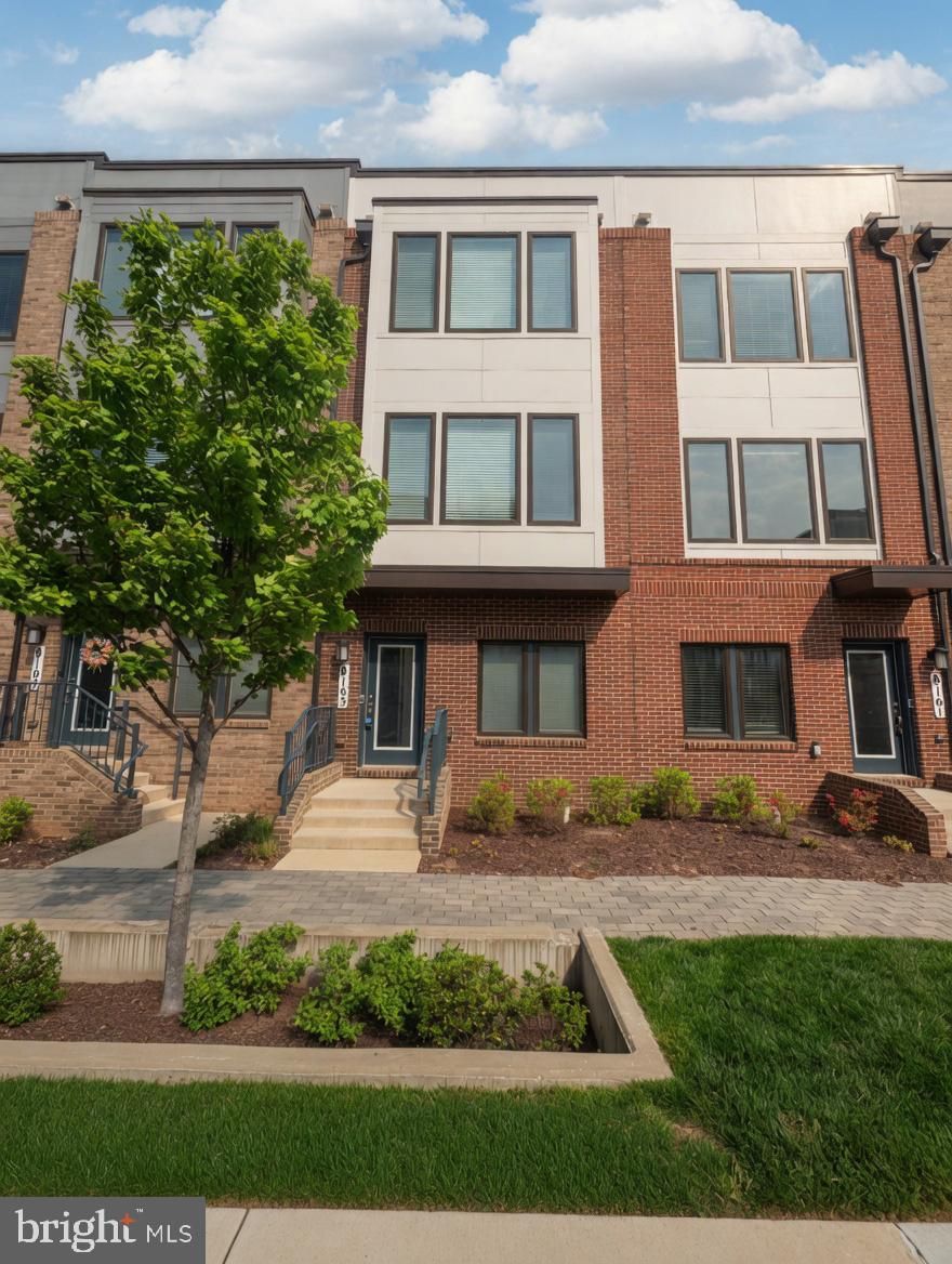 Located in Derwood’s Westside at Shady Grove, this 3-bedroom, 3.5-bath townhome built in 2021 offers contemporary finishes, a practical layout, and a highly convenient commuter location.

The bright and versatile main level features living and dining areas that flow together, creating an open-concept layout suited for entertaining. Large windows bring in great natural light, while the centrally positioned kitchen keeps everything within easy reach. It features a large island with bar seating, quartz countertops, stainless steel appliances, and ample cabinetry. A powder room and private balcony complete this level.

Upstairs, the bedroom level is arranged to maintain privacy between rooms. The primary suite includes a walk-in closet and a well-appointed en-suite bath with dual vanities, a glass-enclosed shower with bench, and a private water closet. A second spacious bedroom also features its own en-suite bath. Laundry is located on this level for added convenience.

The top floor adds valuable flexibility with a large bonus living area, a third bedroom, and a full bath, ideal for guests, a home office, or additional living space. This level also provides access to a private rooftop terrace.

The entry level includes access from both the front door and the attached two-car garage.

Located next to Shady Grove Metro, I-270, ICC-200, and major employment hubs, along with nearby shopping, dining, and everyday essentials. Parks, walking paths, and community features contribute to the neighborhood’s appeal. 

An ideally located home that offers a balance of space, convenience, and modern living!