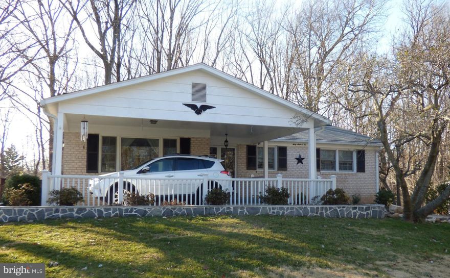 Fantastic Orange Hunt Estates Rambler w/ full walk out basement! Open and bright main floor with hardwood floors. Double door entry leads to large living/dinning room combo with great picture window view of rear trees! Big kitchen with granite counters and backslash.  Huge bright eat in table space with large window and nice pantry. House recently painted. Upstairs bedrooms have wood floors. Updated baths! New custom fixtures match the sturdy cast iron tubs. Full walk out lower level with large bedroom and den. Andersen Windows. Family room has fireplace with wood stove insert and built in counter. Main level access to screened in porch, deck also lower level patio and fenced rear yard. Tops schools in West Springfield pyramid. New HVAC system and newer roof! Really nice home!