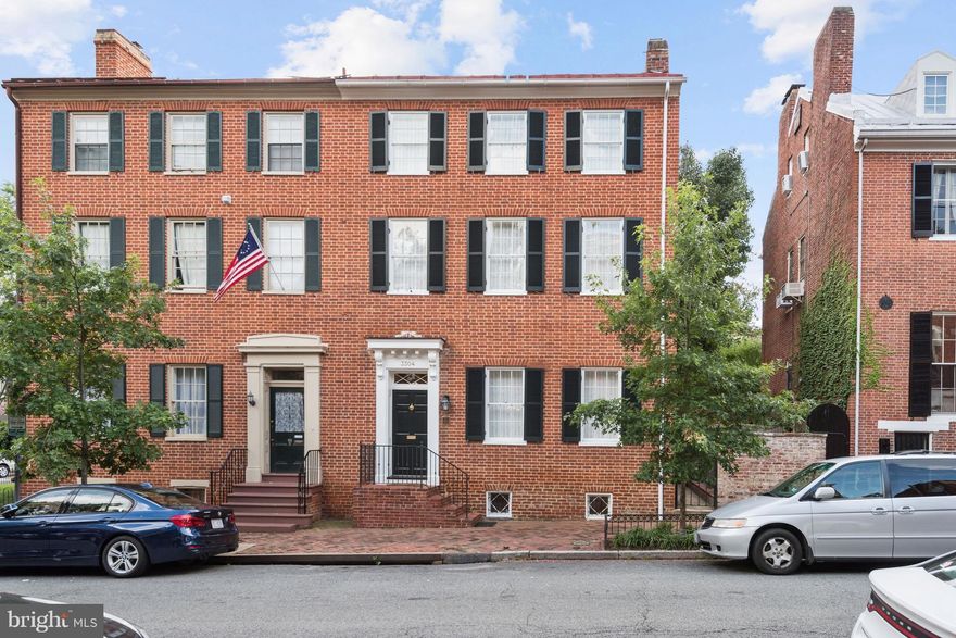 Beautiful 1815 Federal, totally renovated. Elegant + comfortable w/luminous, high-ceilinged rooms, tall windows, 3 fireplaces & exquisite finishes and detailing. Sunny LR, lg DR, bright kitchen/fam rm open to delightful private landscaped garden. 4BR up including spacious master suite + upper and lower level laundry. Covered parking for 1 car + add'l space.