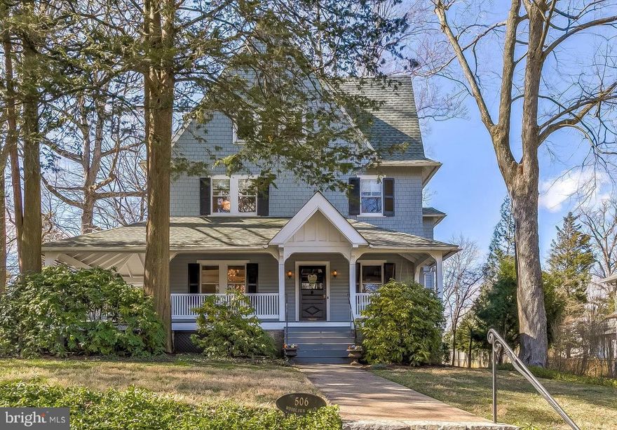 This classic Roland Park beauty with modern updates will immediately welcome you home! The picturesque wrap around porch, with its cozy sitting areas and soothing porch swing, provides a gracious entry to the spacious interior, where you will find rooms awash in light, all creating lovely areas for conversing, eating and relaxing. Complementing the exquisitely appointed open spaces are 10-foot ceilings, inlaid hardwood floors, stately moldings and jeweled lighting fixtures. Prepare to be stunned when you enter the Architectural Digest  worthy dining room, with its antique leaded glass and stained windows. The bright, updated eat-in kitchen flows seamlessly to a wonderful outdoor entertaining area that boasts a heated in ground spa and outside shower. A cozy sitting room, charming powder room and large mudroom, with laundry and great storage, complete the first floor. And just a few feet from the mudroom door is the oversized 2-car garage. The second floor is accessed by either the main staircase or the back staircase and features a primary suite with a bay window, full bath and separate office. Two additional bedrooms and a large hall bath finish the second floor. A light filled staircase takes you to the enviable third floor, with high ceilings, 2-3 bedrooms, 2 full bathrooms and additional rooms that can be used for work or play. Two separate staircases also lead you to the lower level which provides a large game room, media room, workroom and full bath, with direct access to the backyard. Lovely bluestone patios, grassy areas and lush gardens complement the sunny, oversized lot in the center of one of Baltimore’s most cherished neighborhoods. You are so close to the Roland Park pool and the trails along the Stony Run as well as coffee shops, the Roland Park library, restaurants, schools and shopping.