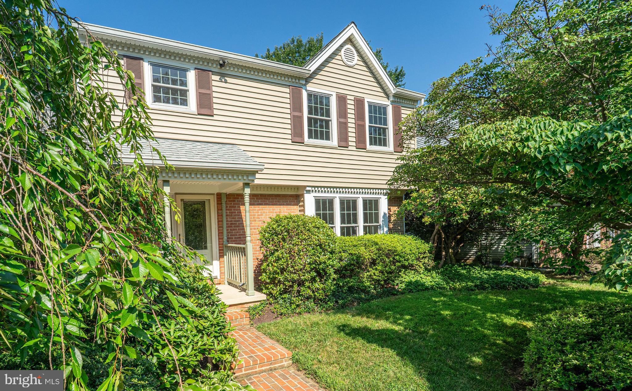 A park-like paradise, this immaculately maintained Colonial offers timeless curb appeal and thoughtful updates throughout. Nestled on a lush, private lot, the home is framed by custom landscaping, hardscaping, and a newly resurfaced driveway. The brick-accented exterior is complemented by a covered front portico, side-entry garage, and elegant hardscape steps leading to the front entrance.
Inside, you're welcomed by an inviting foyer featuring crown molding and gleaming floors that flow throughout the main level. The formal living room boasts a large bay window and crown molding, seamlessly opening to the dining room accented with chair rail and additional crown molding.
A rare main-level primary suite offers a full en suite bath with a walk-in shower and tasteful finishes. The gourmet kitchen features rich cabinetry and table space for casual dining, with sliding glass doors that lead to the screened-in porch and back deck for a seamless indoor-outdoor experience.
Just off the kitchen, the family room impresses with its vaulted ceiling and striking wood-burning fireplace. Filled with natural light, this inviting space is perfect for both cozy evenings and lively gatherings.
Upstairs, you’ll find three generous bedrooms, each with ceiling fans and plenty of natural light. These rooms share a beautifully renovated hall bathroom, offering fresh finishes and modern comfort.
Enjoy the outdoors from the comfort of the screened-in porch with its vaulted ceiling, an inviting space to relax and take in the peaceful surroundings. Just beyond, the newer back deck (2019) offers the perfect perch to enjoy the beauty and privacy of the backyard. A storage shed adds practical space for tools and equipment.
The lower level offers a spacious unfinished basement with a rough-in for a future bathroom, a large window that brings in natural light, and direct access to the garage. Whether you envision a home gym, workshop, extra living space, or simply great storage, the possibilities are wide open.
Recent updates include newer roof, windows, siding, water heater, and deck—making this home as functional as it is beautiful.
Enjoy a top school district, incredible convenience and a stunning private oasis!
