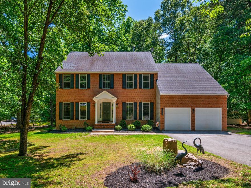 Nestled on 3.46 acres surrounded by the privacy of mature trees, this beautiful, brick colonial has everything you are hoping for in your dream home and more! With over 3000 sq ft on the main and upper levels, there is plenty of space for everyone. The bright and light filled two story foyer offers a welcoming entrance. The large kitchen has a center island, granite countertops, updated stainless appliances, & large pantry closet. The kitchen is open to the spacious family room with vaulted ceiling and pristine floor to ceiling brick, wood burning fireplace. There is a separate dining room and living room, a first floor office which could also serve as a bedroom or playroom and a laundry room just off the kitchen. The 2nd floor provides 5 spacious bedrooms including a large primary bedroom with cathedral ceiling, private full bath with double vanity, soaking tub, separate shower, two walk-in closets, and a stylishly renovated 2nd full bath. The 5th bedroom was originally designed as an open loft, overlooking the family room, and could be returned to a loft. The unfinished basement offers over 1500 additional square feet giving you the flexibility to expand your living space, along with a side walkout entrance. Relax and unwind on the newer deck just off the family room , a perfect place to dine alfresco and take in the acres of surrounding nature and wooded privacy. The house is tucked away from Forest Glen Dr,  on a private entrance road. Attached 2 car garage and ample parking. There is NO mandatory HOA. Schedule a tour today and imagine the endless possibilities!