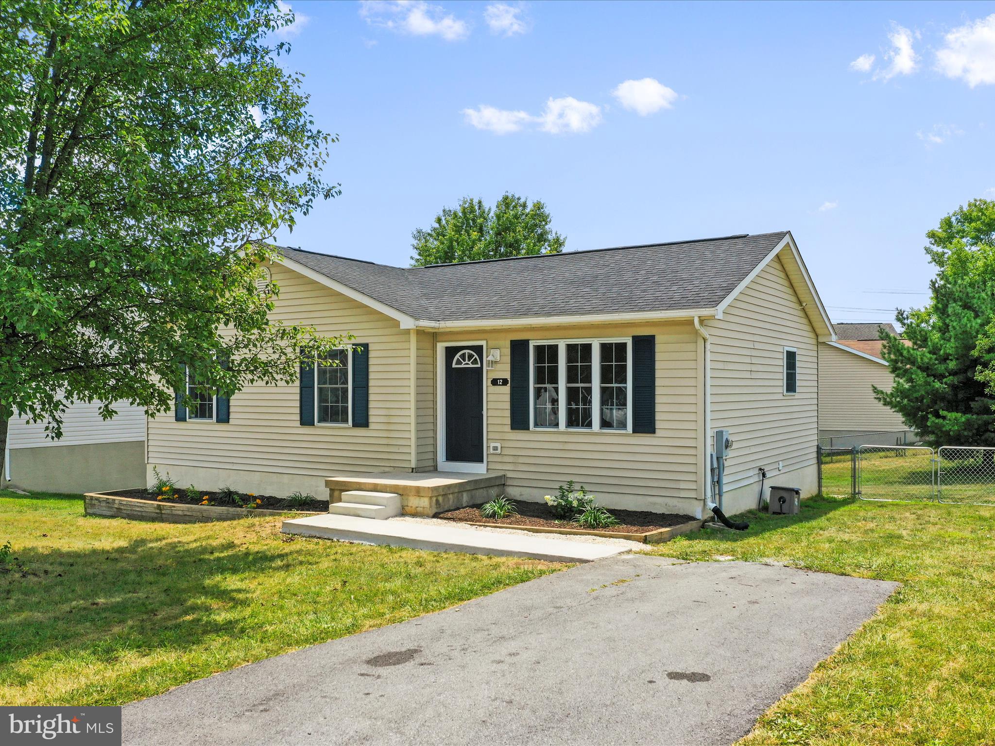 This lovely home offers all new roof, HVAC system, stainless steel appliances, LVP flooring throughout every room on the first floor, bathroom vanities, mirrors, lighting, toilets, and carpet in the basement along with freshly painted walls, cabinets, and deck! The flowers beds are recently landscaped and mulched, and a new sidewalk was poured leading from the driveway to the new, navy blue front door. There is a new gate in the backyard that leads to a large fenced in yard on this fantastic corner lot. If this is the home you have been waiting on, schedule your showing today!