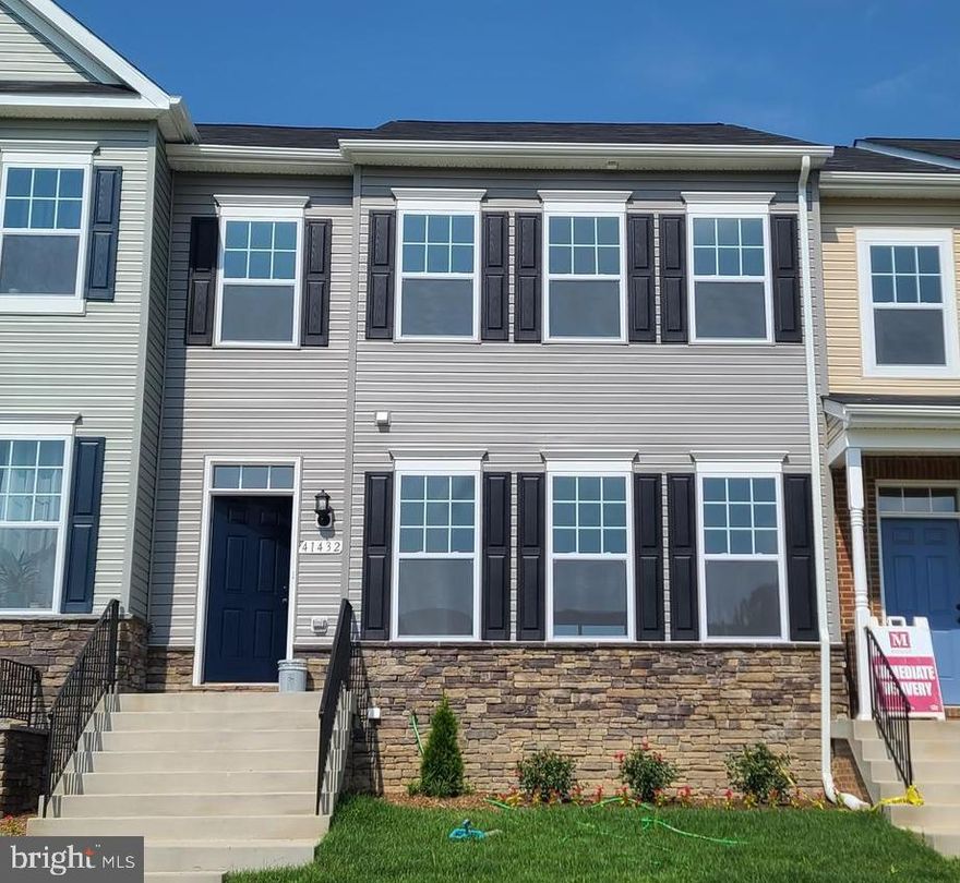 Sold & Settled Compton # 1 Townhome  at the Clark's Rest neighborhood in Leonardtown. This layout is the Compton" Rear Kitchen Model";  featuring a  2-Car Rear Load Garage w. 3 bedrooms/ 3.5 baths with a finished basement ft. rec room and full bath. Upgraded options planned for this home include vinyl planks at Foyer, Powder Room and Dining Room, Stainless Steel Appliances, Granite Counters, upgraded cabinets, ceramic floors and upgraded surrounds for the owners bath, tray ceiling in owners suite,  plus a large 19'6" x11' composite deck and garage door opener.