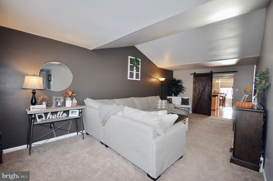 Visit this lovely 3 bedroom, 1 bathroom townhome in the Neshaminy Valley section of Bensalem. This property features a 2 car driveway and cozy entry with small front patio and covered door area. Enter into the foyer, featuring a sizable coat closet, then walk into the living room with newer carpeting, fresh paint and cathedral style ceiling. There is also a large front window for plenty of natural sunlight. From the living room, walk through a doorway with a new barn style door and hardware into the open galley kitchen with plenty of counter space, loads of cabinets and view into the dining room. The dining room features a newer chandelier and a custom, freshly painted shadow box wall. This room also features large windows that overlook the pretty, fenced-in rear yard. You will enter the yard once you travel through the spacious utility/laundry room with an updated HVAC system and new water heater. The yard has a large storage shed, newly poured concrete patio and complete perimeter fencing. Back in the home, as walk down the hallway towards the 3 bedrooms, you can stop in the almost all new full bathroom. The 3 well-sized bedrooms all include large closets. There is also a new pull down attic stairwell for plenty of extra storage. This home is truly move-in ready so make your appointment to visit today!