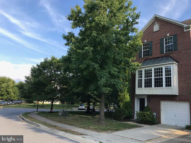 Spacious end-unit Townhome, immaculate and beautifully cared for in sought after Waverly Woods 3 BR, 2.5 Bath, Sun-room, Family Room, Gourmet Kitchen, All Appliances, Hardwood Floors, Ceiling Fans, Skylights, Blinds and more! Fully Finished Basement, Recreation Room, Deck, Covered Patio, 1-Car Garage. Golf Course Community, Walk to the Waverly Shopping Center, Awesome Howard County Schools