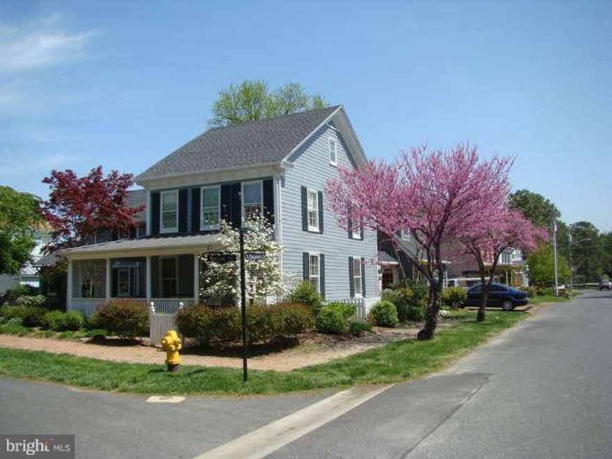 Wonderfully maintained St. Michaels classic.Ideally situated on a corner lot, this spacious historic home has been tastefully updated to satisfy all. Offering 3 bed with 3.5 baths, h/w flooring, 3 f/p, formal living and dining rooms,professionally landscaped yard and 2nd floor  porch offering great views of St. Michaels harbor. Detached 2 car garage with 2nd floor guest suite w/ jaccizi tub.