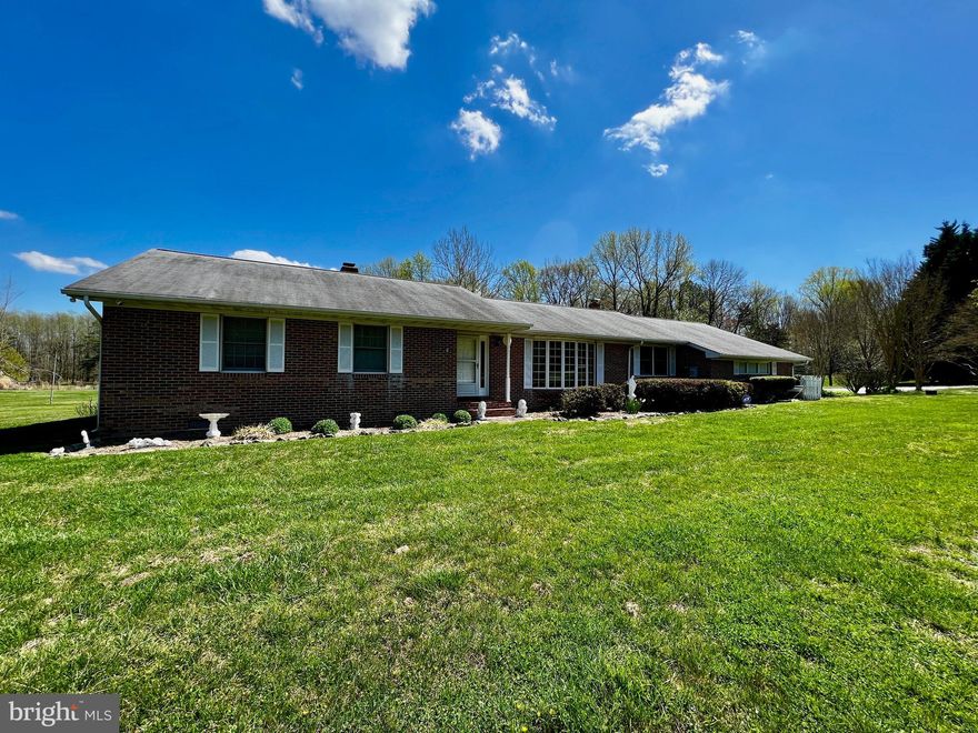 Welcome to your dream home waiting for your personal touch! This charming rambler situated on an expansive 3-acre lot offers the perfect blend of tranquility, convenience, and limitless possibilities. There is no HOA and a spacious driveway for storing RVs, trailers, and boats. Create your own outdoor oasis, cultivate a beautiful garden, or even bring your furry friends along for a run. The expansive yard allows for many options, including the addition of a large playground or a workshop—whatever your heart desires!

Step inside and be greeted by an inviting foyer that leads you into the spacious and sunlit living areas. The living room is the perfect spot to unwind and relax after a long day. Bathed in natural light, it offers a cozy ambiance, making it an ideal place to curl up with a book or gather with loved ones for movie nights.  Start envisioning your new home by scheduling a tour today!!!