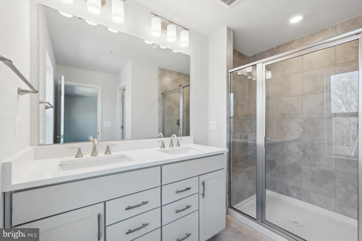 IMMEDIATE DELIVERY – LUXURY TOWNHOME AVAILABLE NOW! Priced at $523,814 – Let's Make a Fantastic Deal! Lot 352 – 9598 Killenney Pl, Waldorf, MD 20601 (End Unit) The Finley | 2,307 Sq. Ft. 3 Bedrooms | 2 Full & 2 Half Baths | 2-Car Garage
Experience the perfect blend of elegance and comfort in this stunning end-unit townhome! Featuring a spacious rec room with a convenient powder room on the entry level, plus oak stairs leading to the open-concept main living area. (PHOTOS OF SIMILAR HOME)
Highlights:
• Gorgeous hardwood flooring throughout the main level
• Gourmet kitchen with sleek stainless steel Whirlpool appliances & stylish quartz countertops
• Expansive great room opening to a 10’x20’ Trex deck—perfect for entertaining & enjoying private wooded views
• Primary suite with luxurious quartz-topped vanity and a large standing shower with built-in seating
Don't miss this opportunity! Contact us today and let’s make this incredible home yours.