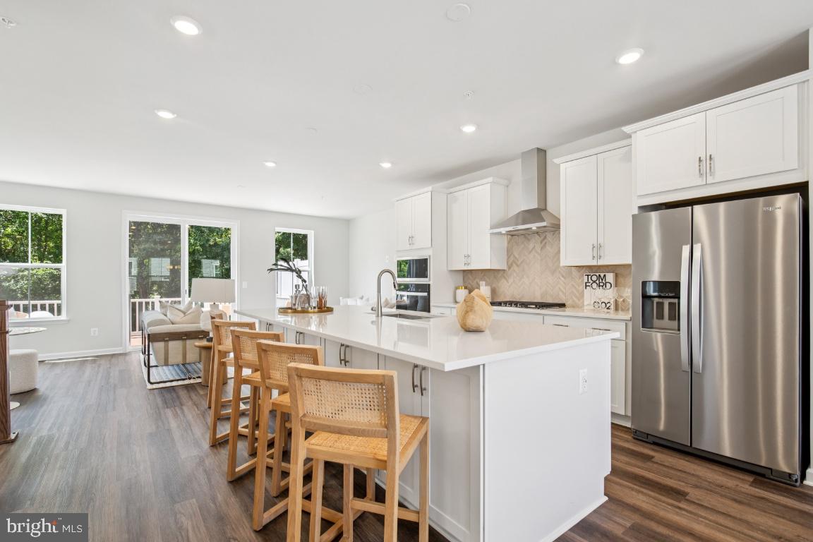 IMMEDIATE DELIVERY – LUXURY TOWNHOME AVAILABLE NOW! Let's Make a Fantastic Deal! Lot 352 – 9598 Killenney Pl, Waldorf, MD 20601 (End Unit) The Finley | 2,307 Sq. Ft. 3 Bedrooms | 2 Full & 2 Half Baths | 2-Car Garage. Experience the perfect blend of elegance and comfort in this stunning end-unit townhome! Featuring a spacious rec room with a convenient powder room on the entry level, plus oak stairs leading to the open-concept main living area.
Highlights:
• Gorgeous hardwood flooring throughout the main level
• Gourmet kitchen with sleek stainless steel Whirlpool appliances & stylish quartz countertops
• Expansive great room opening to a 10’x20’ Trex deck—perfect for entertaining & enjoying private wooded views
• Primary suite with luxurious quartz-topped vanity and a large standing shower with built-in seating
Don't miss this opportunity! Contact us today and let’s make this incredible home yours.