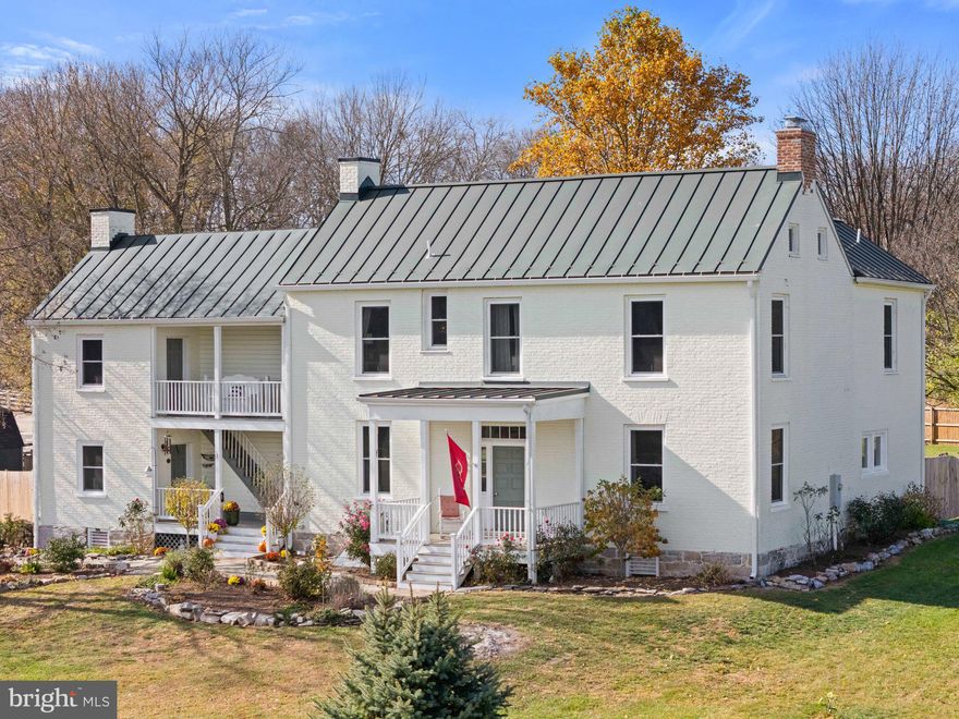 Welcome to "Rose Lawn"! Listed as a Jefferson County Historic Landmark, this beautifully preserved late 18th century colonial farmhouse is nestled on a scenic 2.7-acre lot adjacent to a working farm, offering views of serene cattle pastures. This charming all brick home combines timeless elegance with modern convenience. The thoughtfully updated kitchen boasts granite countertops and stainless-steel appliances, seamlessly blending with the home's historic character. Inside, the unique floor plan provides generously sized rooms with nicely preserved original hardwood floors and original wood trim throughout. Entertain with ease in the formal dining room, warmed by a classic wood stove, or relax in the family room, outfitted with a modern electric fireplace insert. Two staircases lead to the upper level featuring a spacious primary suite, complete with a private sitting/dressing area with a walk-in closet. The unfinished basement provides tons of storage space, and the separate root cellar houses the home's original fireplace. Extras such as all new double hung windows, an upper-level laundry closet, ceiling fans, tiled bathroom floors, an original clawfoot tub, zoned central heating and cooling, and a water softener add to the appeal of this home. Outdoor living spaces include three cozy front porches, a stamped concrete patio in the back, and a fully fenced yard, complete with a separate garden area and a separately fenced area for your pets/small farm animals. All animals are welcome! A large storage shed with loft adds extra storage or workspace. Discover the perfect blend of tranquility and convenience with this stunning home, ideally located just minutes from Charles Town, Martinsburg, Shepherdstown, and Harpers Ferry. Enjoy easy access to the Duffields Train Station, only 11 minutes away, for a hassle-free commute. For frequent flyers, you're just an hour away from Dulles International Airport, 1.5 hours from Ronald Reagan Washington International Airport and Baltimore Washington International Airport, making travel a breeze. This home offers the best of both worlds—peaceful country living with all the amenities of city life right at your doorstep. Don’t miss the chance to make this your dream home!