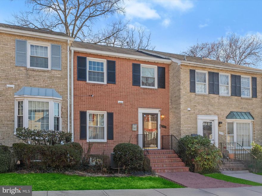 Nestled in a prime Silver Spring location, this brick-front, three-level townhome offers the perfect balance of comfort and convenience. With Wheaton Mall, scenic parks, and the Wheaton Metro Station just moments away—not to mention easy access to MD-97 and I-495—this home ensures seamless connectivity while providing a peaceful retreat.
A charming brick walkway and stairway lead you to the inviting entry, where a bright foyer is illuminated by two modern light fixtures. Hardwood floors flow much of the home, adding warmth and character to each space. Thoughtfully updated lighting fixtures enhance the home’s inviting atmosphere, while classic details lend timeless appeal. The formal dining room, accented with chair railing, opens to the kitchen featuring white cabinetry and sleek stainless steel appliances. Just beyond, the spacious living room boasts a distinguished fireplace and a sunlit bump-out window, creating an ideal setting for relaxation or entertaining.
Upstairs, the primary suite offers a tranquil escape with dual closets and a private en-suite bath. Two additional bedrooms, each with hardwood flooring, share a full bath, completing the upper level.
The lower level extends the home’s generous living spaces, featuring a family room with a second fireplace and an oversized sliding glass door that bathes the room in natural light. This level also includes a dedicated laundry room, a storage room with a built-in workshop area, and direct access to the backyard.
Step outside to the privacy-fenced backyard, where a paver patio provides a serene outdoor space. 
With elements of classic charm, spacious layout, and unbeatable location, this home offers a fantastic opportunity to make it your own.
Please note: photos depicting furniture have utilized virtual staging