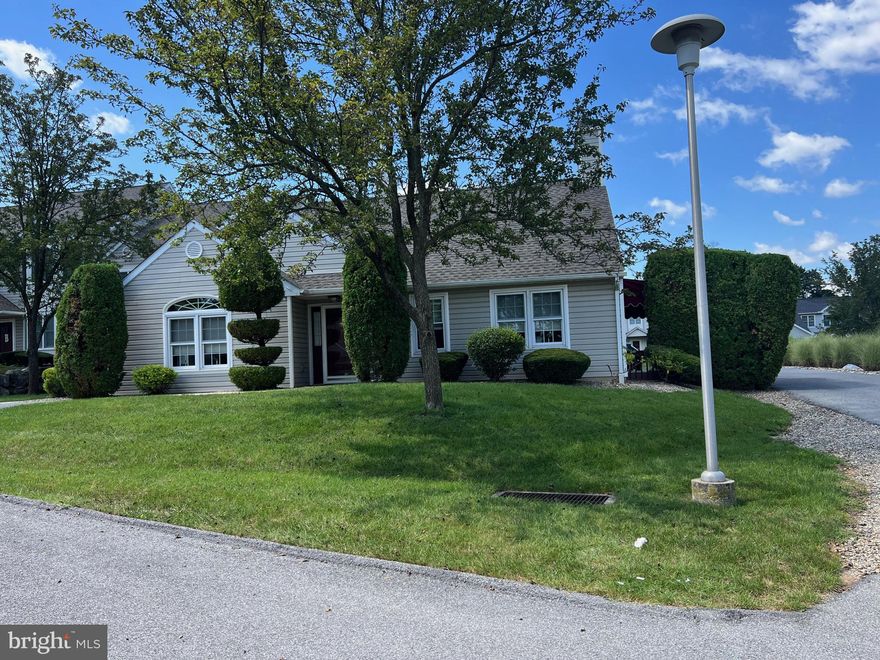 Spacious and clean this 2 bedroom 2 bath home offers many conveniences and features beyond normal.  The great room open concept allows many furniture placement options and great flow for guests and family gatherings.  The 2 car garage with a key less entry and automatic opener,  has entry through the laundry and into the kitchen.  Upgraded stainless appliances with granite counter tops and room for eat in make this kitchen very functional.  The outside maintenance free trek deck is awning covered offering sun and weather protection and is very private.  Additional storage is available with a pull down stairs to the attic.  There is a North Star water conditioner, Eco Water system  and a central vacuum system.