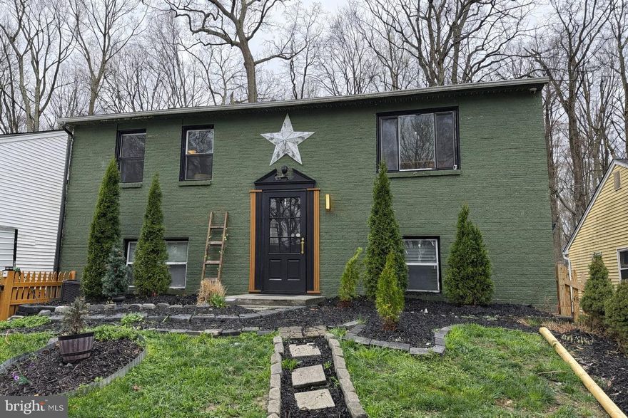 Welcome home to this charming and character-filled property that blends warmth, personality, and everyday functionality. From the moment you arrive, the eye-catching exterior with its rich green façade, mature landscaping, and inviting walkway creates a welcoming first impression full of curb appeal.

Inside, you’ll find a cozy and comfortable living space perfect for relaxing or gathering. The spacious living room features abundant natural light, a large sectional for entertaining, and a warm, inviting feel that makes it easy to settle right in.

The kitchen offers a unique and functional layout with ample cabinetry, open shelving for display, and plenty of counter space for cooking and hosting. Stainless steel appliances and distinctive finishes add character, while the layout maximizes storage and usability.

Throughout the home, you’ll notice thoughtful touches, charming details, and spaces that feel both lived-in and loved. Whether you’re enjoying a quiet night in or hosting friends and family, this home offers a welcoming environment inside and out.

Perfect for buyers looking for something with personality and potential, this property is ready for its next chapter.