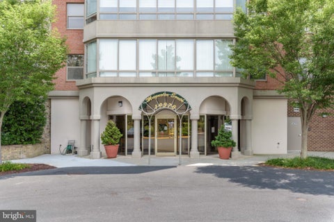 Photo of 19370 Magnolia Grove Sq #107, LEESBURG, VA 20176 (MLS # VALO2135700)