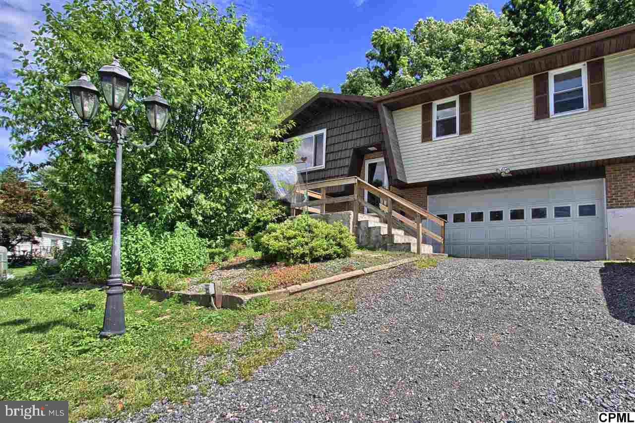 YOU HAVE FOUND A HOUSE TO CALL HOME WITH THIS VERY WELL MAINTAINED BI-LEVEL IN SUSQUENITA SCHOOL DISTRICT. THIS HOME OFFERS A LARGE COUNTRY KITCHEN, 3 BEDROOMS, ONE FULL BATH AND ONE HALF BATH. FAMILY ROOM IN LOWER LEVEL. PRIVATE FENCED IN BACK YARD. NEW ROOF IN 2001 WITH A 25 YR. WARRANTY, CORIAN COUNTERTOPS IN KITCHEN, LARGE FLORIDA ROOM OFF THE BACK OF THE HOME THAT OPENS ONTO A REAR DECK. SCHEDULE YOUR SHOWING TODAY!!