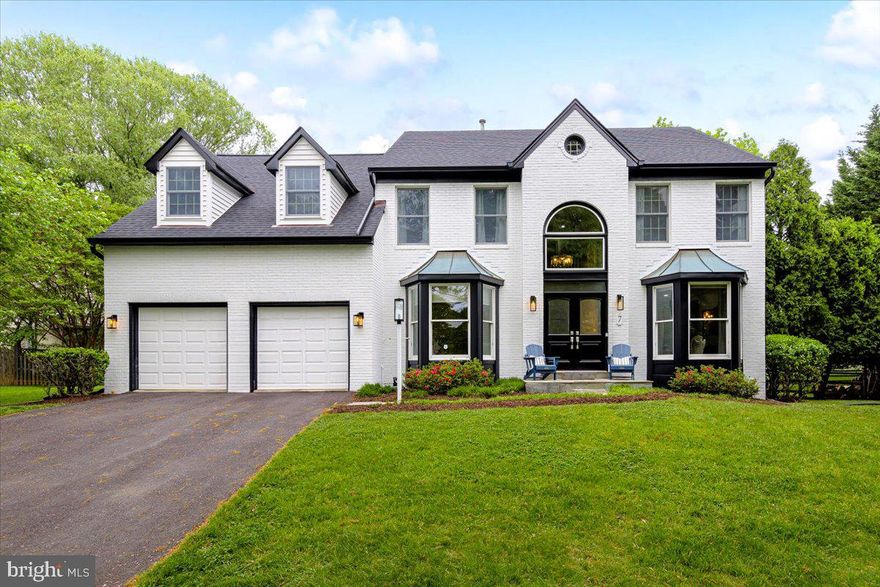 *Interior photos have been removed per new owner's request*
Welcome to 7 Mojave Court, a spectacular 5-bedroom, 4.5-bathroom home in the Rose Hill Falls neighborhood of Rockville, Maryland! Situated on a cul-de-sac with 0.3-acre of pristine property, this gorgeous home features a timeless design with a whitewashed brick exterior and black accents, surrounded by well-manicured landscaping.

The interior showcases a thoughtful layout with spacious rooms, high ceilings, gorgeous flooring, and plenty of natural light. Just inside the front door is a magnificent 2-level foyer with a grand staircase and chandelier, flanked by a study on one side and formal living room and dining room on the other. Further inside, the seamlessly integrated kitchen, breakfast area, sitting room, and family room are essentially the heart of the home! The well-appointed kitchen is a chef’s delight, boasting a large island with prep sink, granite countertops, unique tile backsplash, stainless steel appliances, and loads of cabinet storage. Recessed lighting combined with contemporary light fixtures highlight the impressive space. With a coffee bar and room for a large dining table, the breakfast area invites all to sit, chat, and have a nice meal. The sitting room, surrounded by large windows, is a quiet place to read, while the family room, with its stone fireplace, is the perfect spot to relax after a long day. A laundry/mudroom off the garage and powder room in the hallway round out this level.

On the upper level, the impressive and spacious primary suite will inspire you with its vaulted ceiling and spa-like bathroom, complete with makeup/dressing area, dual vanity, large soaking tub, and glass shower. Plus, the custom walk-in closet with built-in shelving and cabinets will leave you speechless! The additional bedrooms on this level, served by two more full bathrooms, are spacious and offer versatility for various needs.

The large, finished basement offers additional flex space with a large, open area and two more rooms with closets. The recessed lighting and luxury vinyl plank flooring throughout offer a bright, clean, and streamlined feel. Another full bathroom, as well as a spacious storage and utility closet are also on this level.

The exterior of this home is just as beautiful as the interior! The flat lot is serene and green, with a wooden deck, pergola, and hardscaped patio in the fenced back yard, and plenty of room to play, garden, or entertain in both the front and back. Views of the serene pond behind the home provide an additional level of peace and relaxation. The tree-filled community offers easy access to multiple walking/biking trails and parks.

This home is conveniently located off I-270 near Rockville Town Center, just moments away from shopping, dining, and local attractions. The Rockville train station is close by with access to Metro, MARC, and Amtrak train lines, and the Rockville Pike connects with other major roadways in the area. With its desirable location, charming features, and endless possibilities, 7 Mojave Court presents an incredible opportunity to make your dream home a reality!

Additional Information: New front door & updated exterior, 2023; New roof, 2021; Kitchen appliances, 2015-2018; 2-car garage, paved driveway, plenty of parking; HOA Fees, $78/month; Very close to local public schools.

Schedule your tour today!