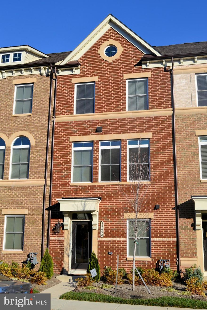 GORGEOUS NV Built townhome in sought after One Loudoun community! Featuring Hardwood/Tile floors, Gourmet Kitchen with Stainless Steel Appliances, Granite Counters & Breakfast Bar, Master Suite with Walk-in Closet & Luxury Bath, Lower Level 4th Bedroom with Full Bath, Newer Washer & Dryer, Built-In Closet Organizers, Wood Blinds, Deck, 1.5 Car Garage & more! Owner/Agent