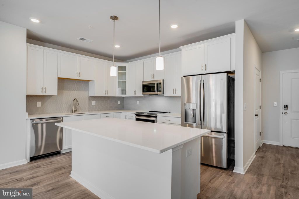 Photo of 4003 Seaside Alder Road #0409 - LILAC, BOWIE, MD 20720 (MLS # MDPG2182022)