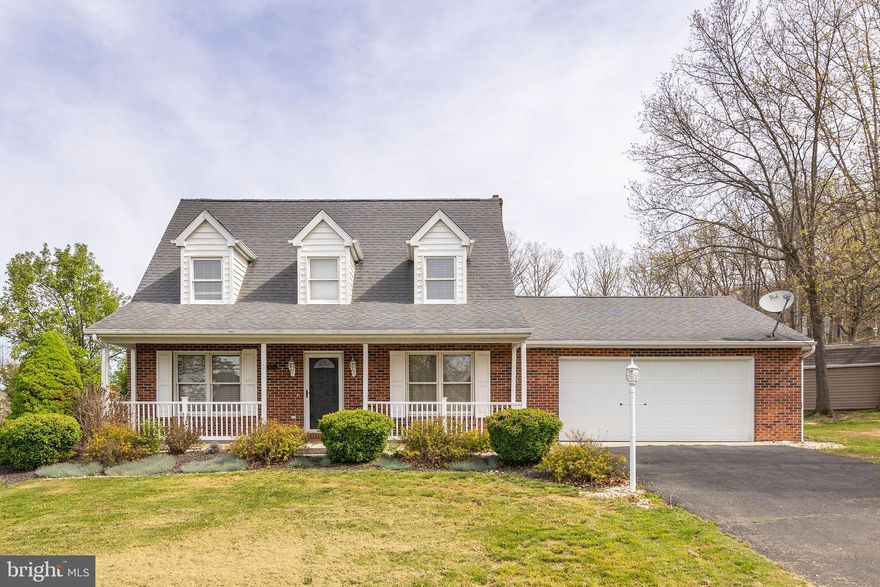 CHARMING CAPE COD WITH MODERN UPGRADES AWAITS A NEW OWNER.  SITUATED ON A LEVEL CORNER LOT,  THE HOME INVITES ONE LOOKING FOR CONVENIENCE, LOW MAINTENANCE, AND PEACEFUL LIVING.  NEWER FEATURES OF THE HOME INCLUDE, GRANITE KITCHEN COUNTERS, BAMBOO FLOORING, AND UPDATED BATHROOMS.  ADDITIONAL ATTRIBUTES INCLUDE A WONDERFUL SCREENED REAR PORCH, FINISHED BASEMENT REC-ROOM, AND ATTACHED 2 CAR GARAGE.  LOCATED IN A QUIET SUBDIVISION AND CONVENIENT TO BANKS, PHARMACY, RESTAURANTS, AND GROCERIES.  THIS ONE EXUDES SMALL TOWN -  WEST VIRGINIA LIVING AT IT'S FINEST.  SCHEDULE AN APPOINTMENT TO SEE IT TODAY!