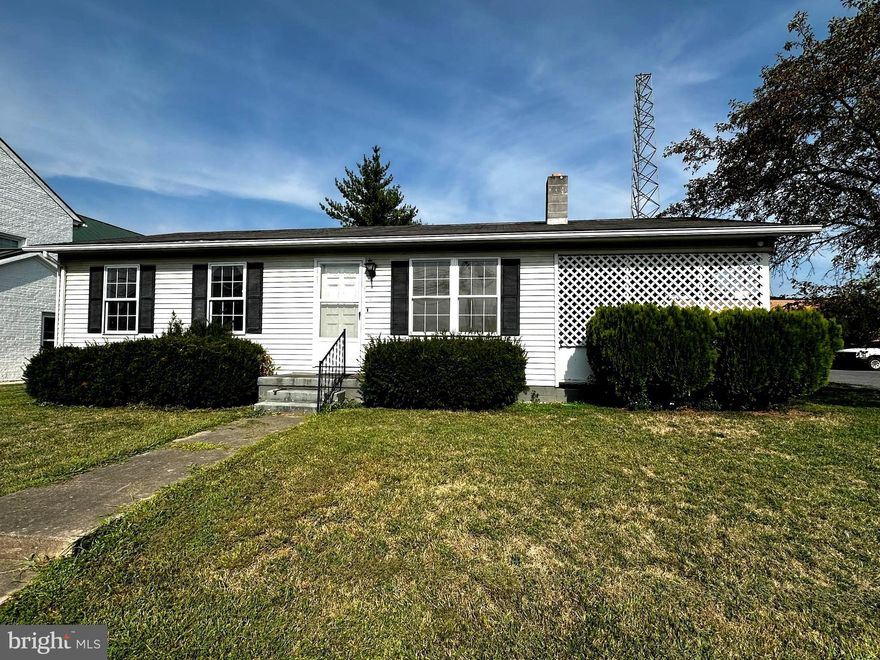 Be sure to check out this Rancher Style home located in Moorefield City Limits.  Priced to Sell!  Walking Distance to the poultry facilities and convenient to local businesses and restaurants.  Great primary home or investment property.  Spacious Rooms, Kitchen with oversized pantry and laundry/mudroom.  HVAC System installed just 2 years ago.  Covered side porch and deck off the large family room.  Natural light is abundant!  Level back yard and outbuilding conveys.