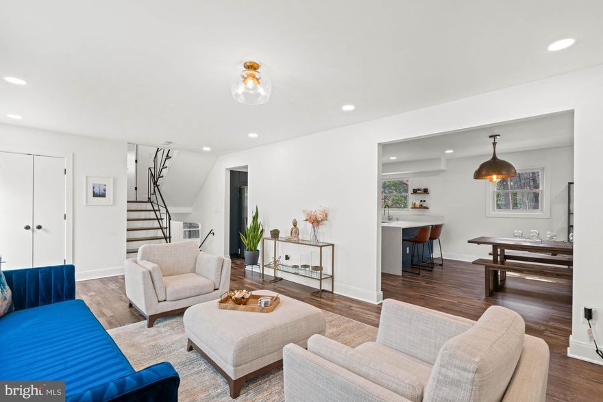 Resort-Style Living, Hidden in Plain Sight.  Tucked into one of Bethesda’s most established neighborhoods, 9817 Fernwood Road is the kind of home that quietly surprises you. Those familiar with the area may pass by without ever realizing what’s inside -- a turnkey retreat where comfort, design, and thoughtful living come together in the most unexpected way. This four-bedroom, three-and-one-half-bath split-level home was built in 1961 and reimagined in 2022 with custom craftsmanship and resort-style details. Shiplap and exposed brick, designer lighting, recessed accents, and curated finishes create a sense of welcome and warmth from the moment you enter. The kitchen is a showstopper -- complete with high-end appliances, wine fridge, wall oven, and built-in microwave, breakfast bar, and access to the flagstone patio and manicured backyard. It's open to both the dining area and sun-filled living room, allowing for effortless flow. Upstairs, the spacious primary suite offers a spa-inspired bath and custom walk-in closet. Three additional bedrooms and a full bath complete the level. The walk-out lower level is full of light and function -- featuring a cozy family room, office nook, and half bath. The finished basement below adds even more flexibility with recreation space, laundry, and storage. Off-street parking and a deep front yard with mature landscaping complete the setting.
Located in the heart of Fernwood, this home delivers peaceful living just minutes from downtown Bethesda, Rockville, and D.C. You’re surrounded by parks, playgrounds, shops, and dining -- including Wildwood, Montgomery Mall, and Pike & Rose. Whether you're settling in or investing in a proven short-term rental, this home is as functional as it is beautiful -- ready to welcome its next chapter.