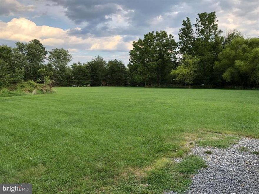 ATTENTION BUILDERS AND DEVELOPERS - This 3.2-acre property is zoned DR 5.5 and presents an excellent opportunity for a small infill residential development.  Engineering feasibility analysis of the property confirms capacity for 11 Single Family or 14 Duplex lots by right based on current zoning.  The property can also accommodate 14 Townhouse Lots with approval of a Finding of Compatibility from the County.  See Feasibility Site Plans in Documents.  The property is surrounded by a stable neighborhood of single-family detached and duplex homes.  Public water and sewer are available.  The property is flat with minimal trees.
NOTE - The existing farmhouse and outbuilding are abandoned and cannot be accessed. The farmhouse has an existing well in the basement.