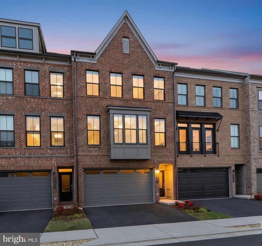 Back on market - prior contract terminated due to a change in buyer circumstances. No fault of the seller. Home is in impeccable condition and ready to go.

Set against unencumbered forest views, this thoughtfully upgraded and meticulously maintained three-level interior townhome in The Retreats at Westfield offers a rare combination of privacy, flexibility, and refined modern living. With approximately $80,000 in premium builder selections and post-purchase enhancements—including upgraded flooring, oak staircases, enhanced blown-in insulation for superior energy efficiency and sound control, and custom Hunter Douglas plantation shutters—reflecting intentional upgrades focused on quality materials, comfort, and long-term livability.

The main living level is light-filled and equally suited to everyday living and entertaining. The gourmet kitchen features 42-inch shaker cabinetry extending to the ceiling, quartz countertops, elevated hardware, and high-end stainless-steel appliances, including an extra-large gas range, anchored by a generous island ideal for casual meals, gathering, or homework time. Open living and dining areas flow seamlessly to a private deck overlooking peaceful, wooded surroundings—offering rare, unobstructed forest views and a serene, year-round backdrop.

Upstairs, the primary suite is a calm retreat with treetop views, a custom walk-in closet, and a spa-inspired bath featuring dual quartz vanities, luxury LED mirrors, and a rain shower. Two additional bedrooms provide flexibility for family, guests, or home-office use, complemented by a conveniently located laundry area on the same level.

The entry-level floor adds exceptional versatility with a private fourth bedroom and full bath—ideal for multigenerational living, an au pair or guest suite, or a quiet home office—along with direct access to the two-car garage and additional storage. Throughout the home, upgraded flooring, LED lighting, and custom millwork reflect a quiet-luxury approach—high-quality finishes that elevate daily living without excess.

Ideally positioned within The Retreat at Westfields, residents enjoy easy access to shopping, dining, major commuter routes, and highly regarded schools, all with low HOA fees.

Private, polished, and purposefully designed—this home adapts beautifully to every stage of life.

* Square footage is approximate and should not be used for property valuation.