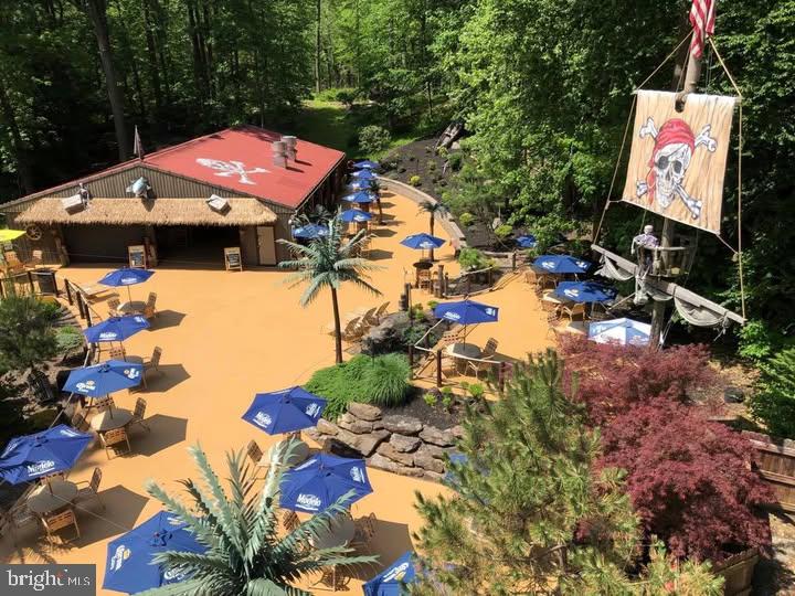 Sellers say bring all offers! This is a unique opportunity to acquire a well-loved restaurant in the heart of Lower Alsace Township, PA. This restaurant and outdoor venue, a tropical paradise, attracted hundreds of people every weekend for their local destination.This establishment, known for its atmosphere to “bring your family for a great meal under the palm trees”, and delicious,home-style cuisine, built a strong local following over the years. The Mountain Springs restaurant boasts a comfortable and inviting dining area, a fully equipped kitchen, and a loyal customer base that returns time and again. The Peruvian wood Bar seats 30, Restaurant seats 96, Travertine tile throughout. The Pavilion, A.K.A. “The Captain’s Cove”, used the patio for outdoor seating, Bar seat 30, 20 Bar tables (barrels), and attracts a full bar and line out the door all summer long. Parking for over 200+ between the two lower lots and the upper lot. The current owner is looking to retire, and is seeking a buyer who is passionate about the restaurant industry and dedicated to continuing the legacy of this beloved Mt Penn summertime paradise.