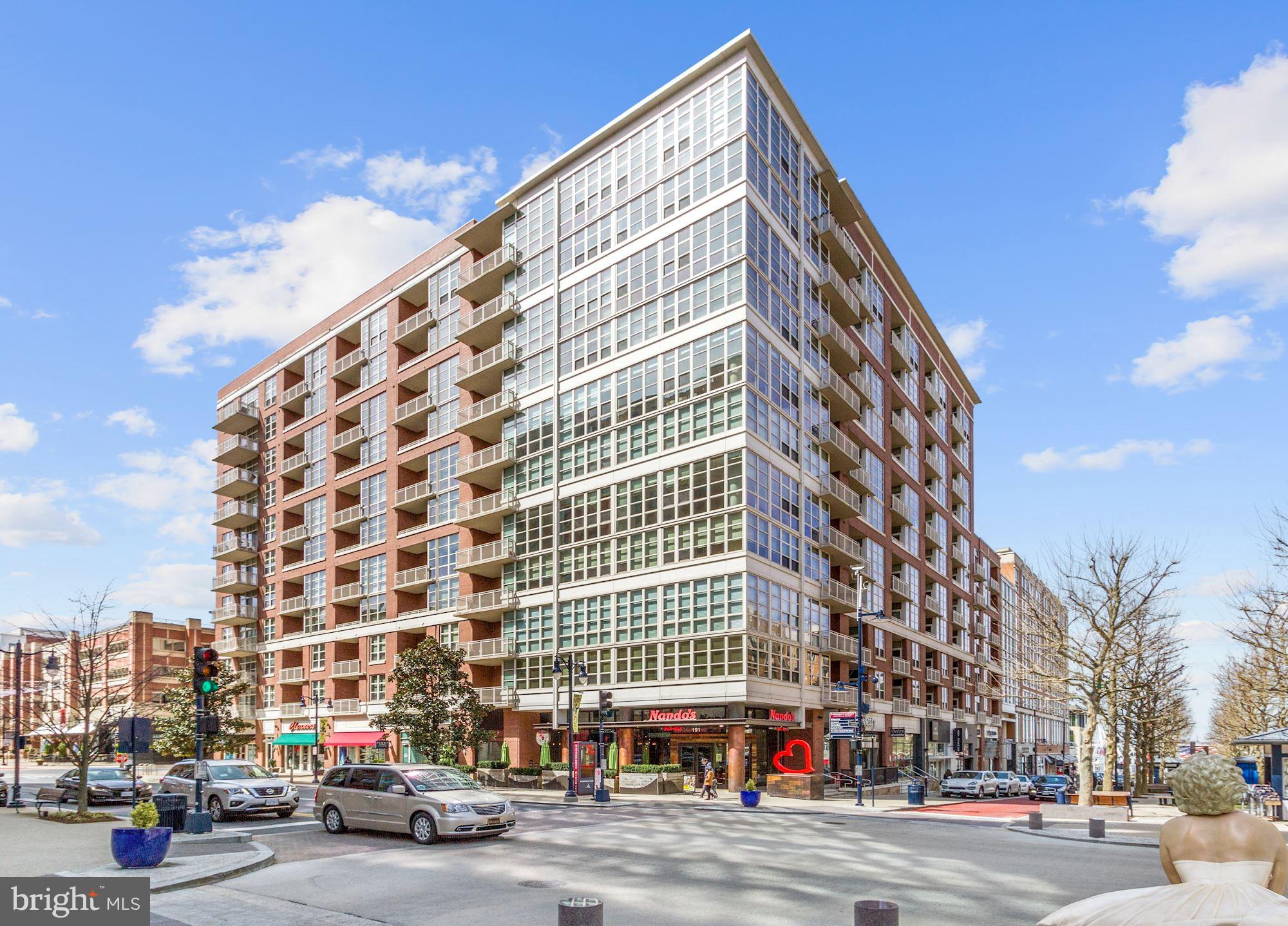 Welcome to Fleet Street Residences, and this fabulous 2-bedroom, 2-bathroom unit, with a spectacular floor plan and 2 assigned parking spaces! With over 1200 square feet, and dual primary bedroom suites, there is plenty of room to stretch out. Enjoy stainless steel appliances, beautiful granite counters, floor to ceiling windows, an in-unit washer/dryer, and a spacious private balcony. Huge walk-in closets in both bedrooms, along with a coat closet and large pantry, provides plenty of storage space. The open living/dining area and breakfast bar in the kitchen are comfortable to entertain, and the TWO ASSIGNED PARKING SPACES in the secure garage make it easy to come and go. Less than a 15 minute drive to downtown DC, and only minutes from Old Town Alexandria. Throw in the front desk concierge, and being only a few steps from so many restaurants, shops, markets, and the waterfront... this is the place to live in National Harbor!