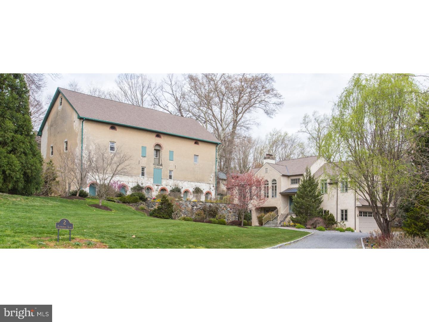 2 Todmorden Lane is a gem in the heart of Rose Valley! As you approach the property you are immediately impressed by the juxtaposition of the historic barn and the classic home that was completed in 2003 and designed by well regarded local architect Ann Ledger. The setting, amidst tiered gardens and historic stone wall remnants, lends drama that is reminiscent of a European enclave, providing surroundings that are unrivaled in the area. Under the conscientious stewardship of the current owners, this unique property has been carefully restored and enhanced creating a remarkable synergy of old world charm, modern convenience and natural beauty. This property features 2 separate living areas, ideal for an in-law suite, visiting guests or returning family members. The main house offers elegant gathering spaces ideal for gracious entertaining, and features a fabulous gourmet Kitchen with granite counter tops which is open to a Family Room warmed by a Rumsford fireplace, a large enclosed Porch offering dramatic views of the spectacular grounds, and a main level Master Bedroom Suite with dual Master Baths and walk in closets. The Lower Level adds considerably to the living space of the home featuring a second Family Room, two Bedrooms, Full Bath, Laundry Room, large Cedar closet and access to the two car Garage. The spectacular stone 1800's Barn, which is on the National Register of Historic Places, provides a large Guest Apartment with Living Room, Dining Room, Den, brand new Kitchen, 2 Bedrooms, Laundry Room and a separate parking area. In addition the barn offers a breathtaking three story loft (think basketball!), studio space and so much more. Visiting this home is truly a singular experience. Call today for a private showing.