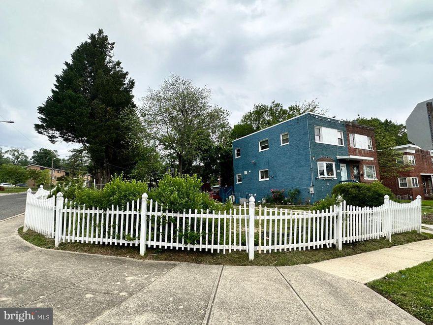 Corner lot with 6 + cars parking spaces. In law suit in the basement with kitchenette, room and bathroom. Just minutes from DC.  Location and enough parking is a plus for this property.  Please excuse the cluster.  Seller is packing to move out.