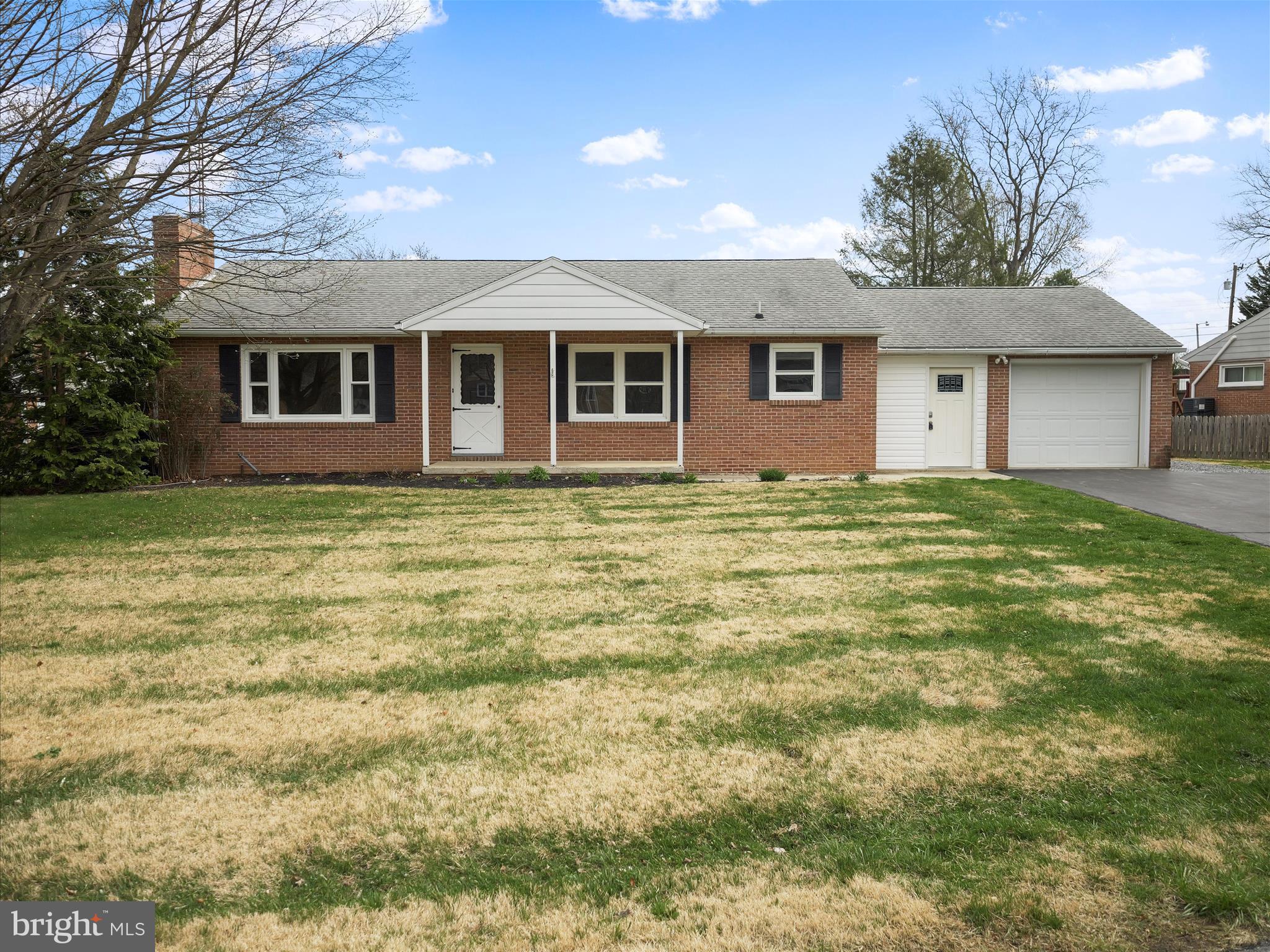 Brick rancher on a corner lot with a fenced backyard. Attached one car garage, breezeway, kitchen, dining, living room, 3 bedrooms, 1.5 baths and a partially finished basement. Hardwood floors throughout bedrooms, dining room, living room and hallway. Primary bedroom has two closets and a half bathroom. The basement has plenty of finished room for family room, game room, whatever you choose. The unfinished area has a workshop area, laundry area and plenty of room for storage. Easy access to 81 for commuters. One Year Home Warranty.