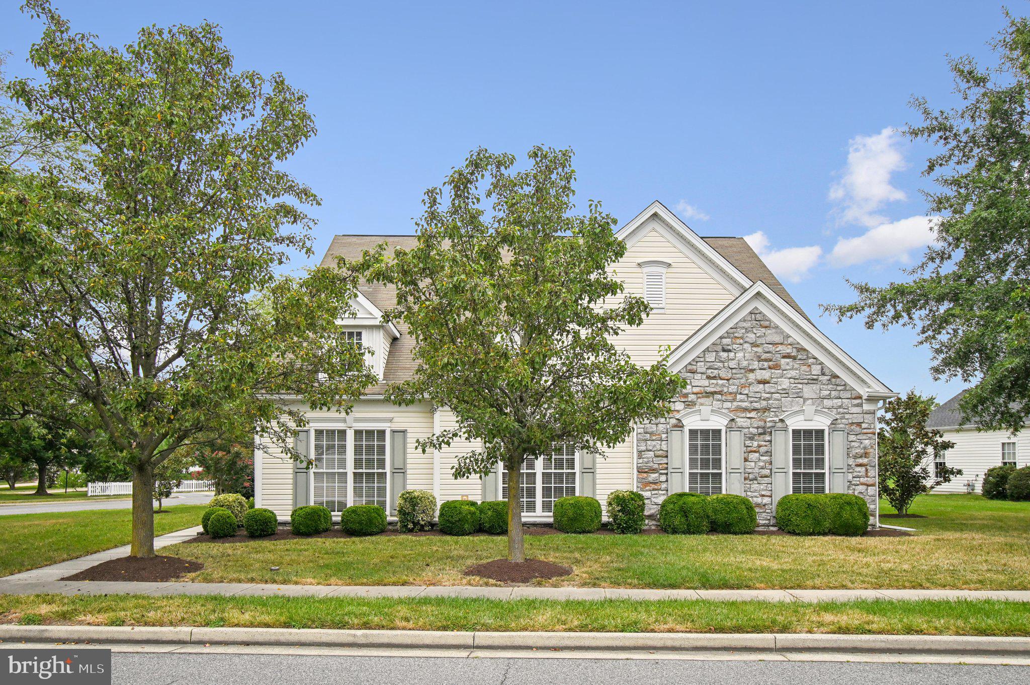 Welcome to 29606 Charles Dr in the sought after Easton Club East community! This spacious two story Hillsboro Model offers the perfect blend of comfort and convenience in one of Easton's premier 55+ neighborhoods. This home was built in Phase 1 of the community and is in a non age restricted section of Easton Club East. Featuring an open floor plan with an abundance of natural light, the home boasts a generous living area, a bright kitchen with granite countertops and ample storage, and a dining space ideal for entertaining. The main level primary suite provides ease of living with a primary private bath and a primary closet. Additional bedrooms are perfect for guests, a home office, or hobbies. Enjoy your morning coffee or evening relaxation in the sunroom overlooking the landscaped patio and putting green. Easton Club East residents enjoy access to fantastic amenities, including the clubhouse, fitness center, pickle ball, pool, and walking paths. All of this is just minutes from downtown Easton's shops, restaurants, medical services, and cultural attractions.