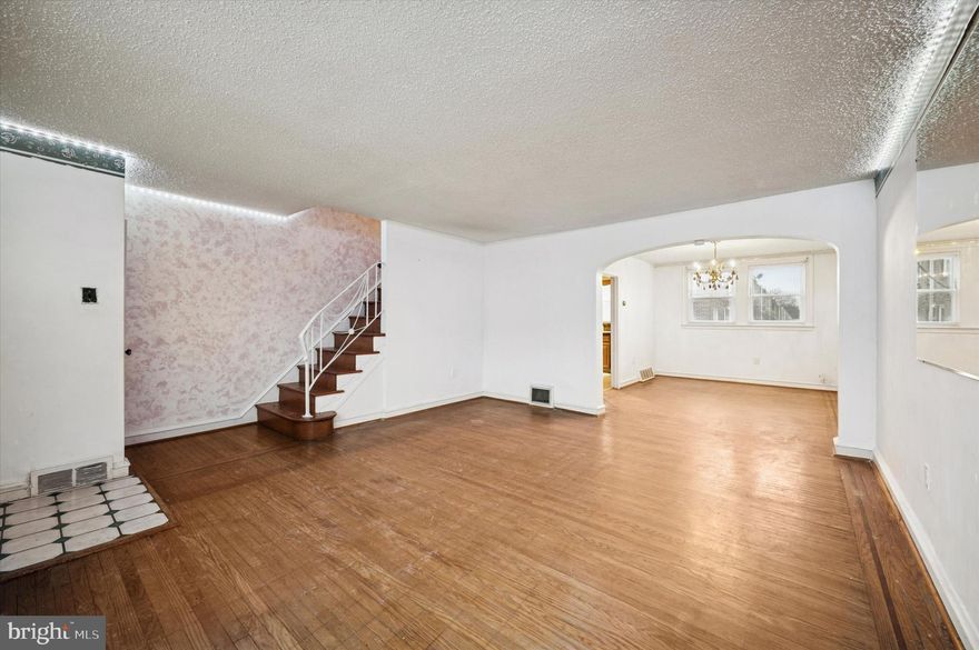 Welcome to this move-in ready 3-bedroom, 1.5-bath home offering a smart layout, flexible living space, and a convenient location. Hardwood floors add warmth to the main level, where a spacious living room flows naturally into the dining area—perfect for entertaining or everyday living. The kitchen is well-equipped with a refrigerator, dishwasher, and stainless steel gas range.

The finished basement provides valuable bonus space ideal for a home office, workout room, media room, or additional living area, complete with a half bathroom and a separate laundry room. Upstairs, you’ll find three comfortable bedrooms with closets and a full hall bathroom.

Enjoy the convenience of a rear one-car driveway for off-street parking. Ideally located near public transportation, including bus routes and regional rail, with easy access to nearby parks, athletic fields, the Lawncrest Library, and the Lawncrest Recreation Center.

With its versatile layout, desirable features, and strong location, this home presents a great opportunity for a wide range of ownership goals.