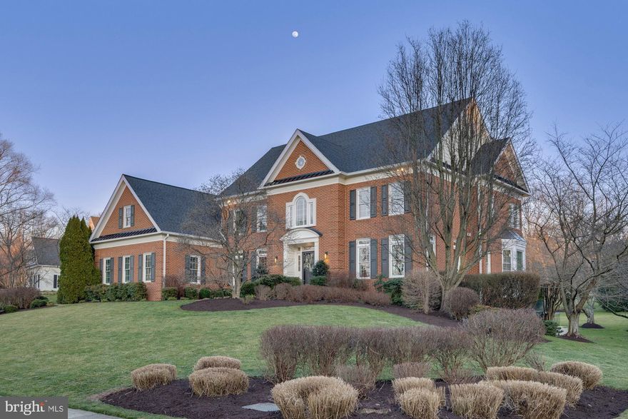 Stunning estate home is situated in the highly desirable Full Cry Farm neighborhood of Vienna, offering a luxurious and spacious living environment. Boasting 6 bedrooms, 4.5 bathrooms, 3 car side-load garage and 6,918 square feet of living space, this property is a true gem. The elegant features include vaulted ceilings, Palladian windows, and exquisite custom built-ins and millwork throughout, adding a touch of sophistication to the home. The main level showcases a formal living room, formal dining room, and a gourmet kitchen equipped with high-end stainless steel appliances, a granite center island with bar-seating option, a butler’s pantry, custom tiled backsplash perfect for culinary enthusiasts. The open floor plan on the main level flows beautifully into the grand 2-story family room with a stone-surround fireplace, creating a cozy yet spacious area for relaxation and entertainment. Main level also features an office with built-in bookcases, laundry room with a chute from the upper level, and half bathroom. The upper level owner’s suite is a private sanctuary with a luxurious smart ensuite bathroom featuring modern amenities such as smart technology connected to the shower, tub and sink,  built-in medicine cabinets, a freestanding tub with a heater and whirlpool, dual vanity, and a custom tiled walk-in shower with frameless door, bench seating, and shower niches. Lower level offers a walk-out basement with a bar and billiard area, an exercise room, an extra bedroom, a bonus room, and a full bathroom, providing ample space for various activities. Outside, the property features a four seasons screened-in porch with heaters, a charming patio area, and a well-maintained backyard, offering a perfect retreat to unwind and enjoy the outdoors.