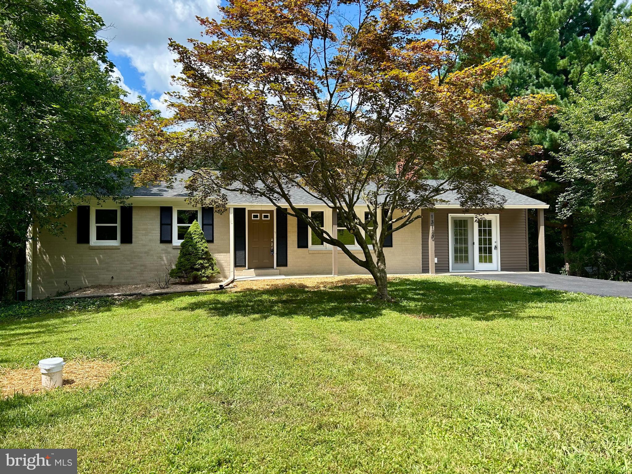 OFFER DEADLINE 9PM 8/17/25. THIS HOME SHOWS LIKE NEW! LARGE LOT AND BACKING TO WOODLANDS. RENOVATED FROM TOP TO BOTTOM IN 2025- NEW ROOF, ENERGY EFFICIENT WINDOWS AND BRAND NEW FINISHED WALK OUT BASEMENT WITH HOME OFFICE AND FULL BATH. NEW 200 AMP ELECTRIC SERVICE, NEW HVAC SYSTEM, MOSTLY ALL NEW PLUMBING AND ELECTRIC. PERMITTED AND INSPECTED WITH FREDERICK COUNTY. ALL THE WORK IS DONE - AND ITS MOVE IN READY! THIS ONE IS SURE TO PLEASE. DESIGNER KITCHEN WITH NEW CABINETS, GRANITE AND APPLIANCES. THREE FULL BATHS WITH NEW VANITIES, TOPS, TUBS, TOILETS, CERAMICS AND FIXTURES. FRESH TWO TONE PAINTS AND NEW FLOORING THROUGHOUT. SITUATED ON .85 ACRES WITH PRIVATE REAR YARD AND DETACHED 2 CAR GARAGE. CLOSE TO MONTOGOMERY COUNTY LINE AND MAJOR COMMUTER ROUTES.