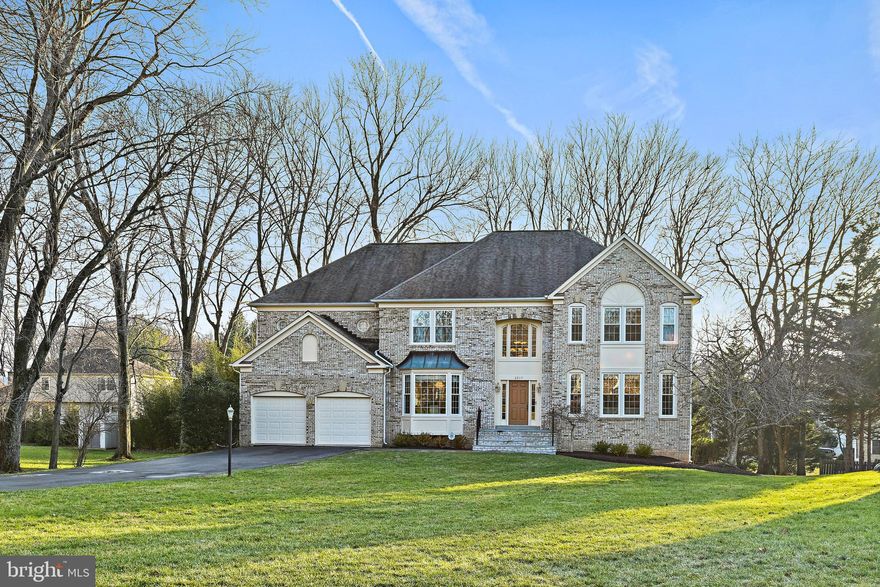 Elegant residence nestled in an exclusive cul-de-sac. This fabulous colonial is conveniently located in the heart of Tysons Corner. Situated privately on a .40 acre lot, this property boasts a long private driveway and an oversized front yard perfect for outdoor activities and games. This spectacular Stanley Martin Winslow model features grand welcoming 2 story foyer and gracefully curved staircase. Formal living room and dining room on each side of the foyer offer luxurious and sophisticated entertaining space. Centrally located home office/study on the main floor provides an ideal space for remote work in the modern age. The distinctively large family room and sunroom offer a private gathering area with a view to mature trees in the backyard. The updated kitchen has upgraded porcelain tiles and is equipped with stainless steel appliances, a build-in combination microwave and wall oven, top of the line kitchen cabinets with soft close feature and exquisite Saturina granite countertops. Upper level features a sophisticated circular hallway offering a spectacular view of the open foyer and family room, 4 large bedrooms highlighted by a spacious primary suite with sitting area, a walk in closet and 2 large closets, and a huge master bathroom, a second suite with a private bathroom and secondary bedrooms with Jack and Jill bathroom. The custom designed lower level presents ample space for work, entertainment, exercise and room for special guest. The potential for creating a personalized vacation retreat in your backyard is unlimited. Brand new maintenance free insulated windows with Low-E glass and argon gas throughout the entire house.  New flagstone front steps with brick veneer and metal railings. New walkway with modern concrete pavers. Newly painted exterior. All new insulation in attic boasting the R value for energy efficiency. Superb location with easy access to transportation, minutes to metro, shopping, leisure, city life, performing arts at Wolftrap, parks, hiking trails including Great Falls and numerous upscale restaurants, all at your fingertips. Welcome home!