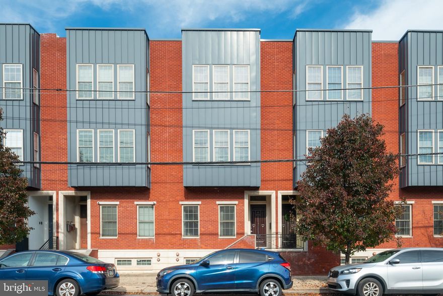 Walk into this Fairmount bi-level condo with high ceilings and a modern kitchen featuring stainless steel appliances, granite tops, and recessed lighting. The kitchen has a great island in the center with sink and dishwasher, one full wall of cabinets along side the fridge allows for lots of storage. The kitchen has space for an eat-in kitchen table and there are large sliding doors to the huge outdoor patio. Let your imagination run wild with the size of this patio- put planters all around the sides and create an outdoor oasis. Back inside, the main level also includes the master bedroom with walk through closets to the en suite master bathroom. The lower level has high ceilings and spacious living room. This level also includes the 2nd full bathroom with whirlpool tub and laundry. The 2nd bedroom has two full windows allowing for plenty of light. At this location, the unit would make a great purchase for anyone, but also an excellent investment for a savvy investor.