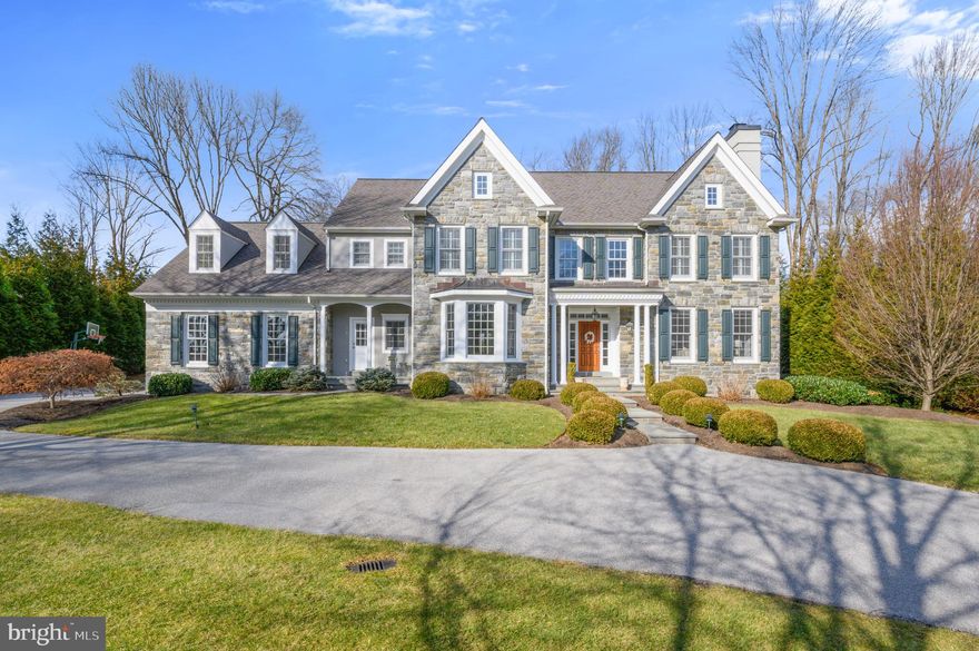 This home is the true definition of a Main line dream house. Located in the estate section of Devon, convenient to Wayne, Newtown Square and the R5 train line, you will love the conveniences of this fabulous location. Immediately, the curb appeal will WOW you. The stone front and beautiful approach are what makes you fall in love with this home on a private cul-de-sac. Nearly 6800 square feet of living space on a one acre lot at end of the cul-de-sac. Wonderful stone  colonial with 5 bedrooms, 5 full baths and 2 powder rooms. Features include site finished oak flooring, extensive millwork throughout, 3 fireplaces; gourmet kitchen with center island, granite countertops, Viking appliances, cherry cabinets; separate breakfast room; butler's pantry with granite, wet bar and Viking wine cooler; striking master suite and bath; 3rd level finished as a private suite with full bath; finished walk out lower level with expansive game room, full bath and a wine cellar; beautiful flagstone rear patio with matching stone fireplace and knee walls; professional landscaping, flat walk out back yard that is fenced in is perfect for entertaining or sports for the kids. This home has been very well cared for and it shows.