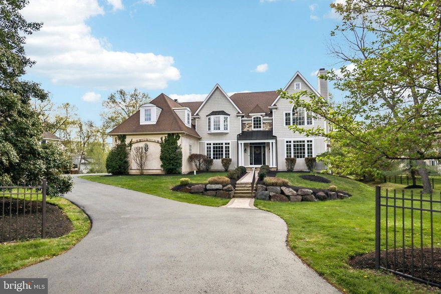 Welcome to 486 Church Rd, a beautiful colonial home boasting 6 bedrooms, 6.2 bathrooms in the heart of Devon and within top ranked Tredyffrin-Easttown Schools. Sitting on a breathtaking 1+ acre lot, this home has been lovingly cared for and offers a ton of upgrades inside and out. As you enter the foyer, you are greeted by refinished hardwood flooring and extensive millwork that extends throughout the home. The formal living room offers a gas fireplace and french doors that lead to the handsome office with paneled walls and built-in bookcases while the formal dining room with attached butler’s pantry is large enough to host all your future gatherings. The gourmet kitchen with commercial grade appliances and island seating is perfect for the cook at heart. Extending from the kitchen is the breakfast room that exits to the composite deck with awning - perfect for al fresco dining. The family room with coffered ceiling, gas fireplace, and built-in entertainment center flows effortlessly from the kitchen area creating an open floor plan that allows everyone to stay connected. The first floor is completed with two powder rooms and a mudroom with built-in cubbies and access to the three car attached garage. The second floor offers a luxurious primary suite with dual walk-in closets, a sitting area with gas fireplace and an expansive marble bathroom with dual vanities, spa-like shower, and jacuzzi tub; 2 more ensuite bedrooms with walk-in closets; two additional bedrooms with walk-in closets that share a bathroom; and a fully equipped laundry room. The third level offers an additional ensuite bedroom with a private bathroom and walk-in closet. The finished, walk-out lower level offers something for everyone- a theater/entertainment area, a well appointed bar, a sound-proof music room, a gym/fitness area, and a full bathroom to rinse off after working out or swimming in the pool. The outside of this home is not to be missed and offers a stunning pool with attached hot-tub, waterfall fountains, a ton of patio space to enjoy the sun and an automatic pool cover- all while overlooking the beautiful grounds. This home is ideally located -close to major roadways for an easy commute and Paoli train station for a nonstop commute to NYC, minutes to some of the best private academies in the area including Episcopal Academy and Devon Prep, and close to the shopping/dining options of Lancaster Avenue, Wayne and KOP. Call today for more information; this property is not to be missed!