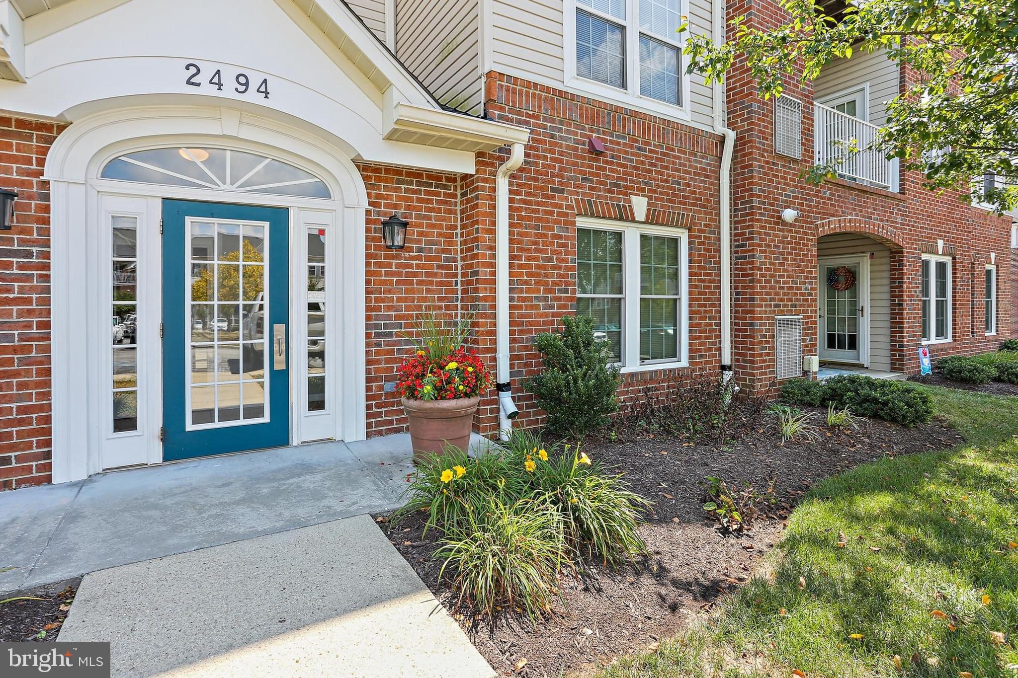 * Welcome to 2494 Amber Orchard Court!*This is the home you have been waiting for! Very Desirable Gated community of Chestnut Point East! Very private deck backing to woods overlooking manicured lawns! Secure and stylish main entrance and elevator service to this second floor spacious 2 bedroom & 2 full bath condominium. Freshly painted and brand new neutral carpet throughout and ready to move right in! Bright and open floor plan, SS appliances, gas cooking, and HVAC & HWH both new 5/23! Conveniently located community that's close to just about everything you need or want! Great restaurants , shopping , and a Seasonal Weekly Farmers market! Some of the many amenities include Walking and Bike trails, Indoor & Outdoor Pools, Community & Fitness Centers and Tennis Courts, and lots more. Carefree living with quick access to major routes, 32, 97, 100 and BWI airport, MARC train, and Fort Meade too.