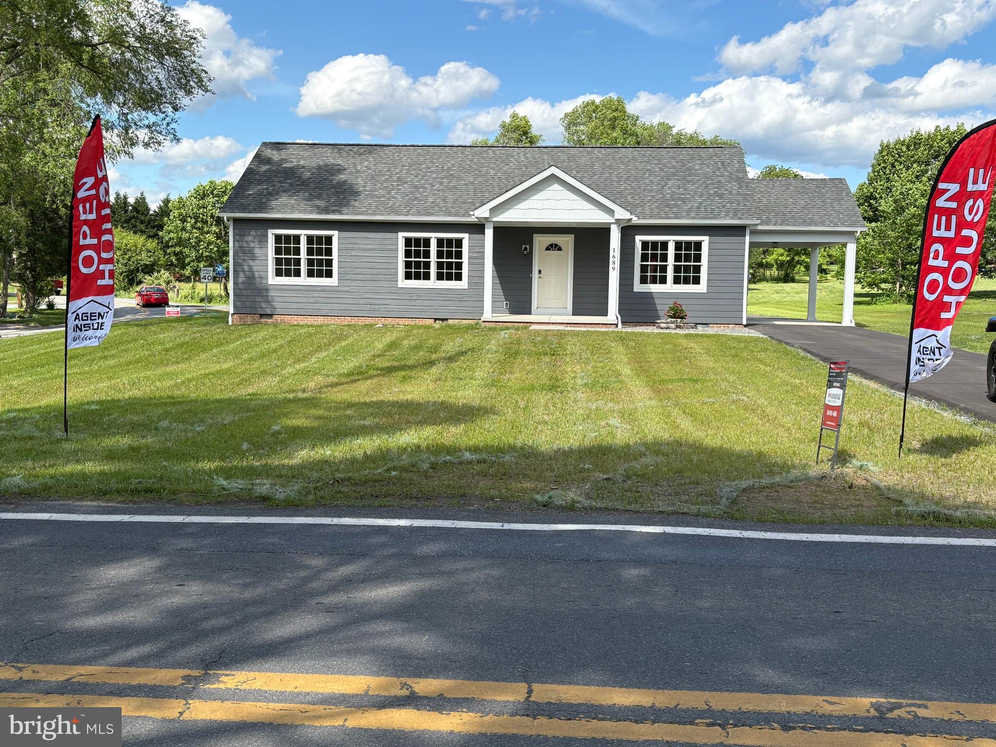 **Charming Home in Gerrardstown, West Virginia**
REDUCED $339000
Welcome to this beautifully upgraded home located in the serene village of Gerrardstown. Spanning 1,375 square feet, this three-bedroom, two-full-bath residence offers a perfect blend of comfort and style.
Step inside to discover a thoughtfully designed layout, with the main bedroom situated on the opposite side of the house for added privacy. The interior features Shaw carpeting and elegant red oak hardwood flooring, creating a warm and inviting atmosphere. Both bathrooms boast plank flooring and luxurious cultured marble countertops, with the master bath showcasing a spacious shower complete with two seats and a convenient utility closet.
Enjoy cooking in the well-appointed kitchen, featuring upgraded oak cabinets and stunning granite countertops, complemented by stainless steel appliances. A separate mud/laundry room off the kitchen leads to the carport, complete with cabinets above the washer and dryer for extra storage, and a coat closet in the mudroom.
This home is equipped with energy-efficient Anderson windows throughout, including in the bathrooms, ensuring plenty of natural light. With walls constructed from two-by-sixes and extra insulation, you'll appreciate the energy efficiency and comfort this home provides. Additional features include a 50-gallon hot water tank, a carport for convenient parking, and a covered back patio perfect for outdoor relaxation.
The exterior is equally impressive, featuring upgraded LP siding and LP shakes on the front porch, and a durable 30-year shingle roof.
Don’t miss the opportunity to make this charming home your own! Schedule a showing today and experience all that this lovely property has to offer.
---