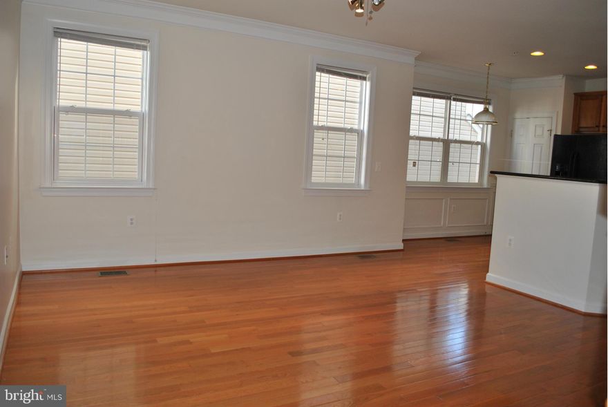 A beautiful 3 bedroom/2.5 bathroom townhome style condo with one car garage located in prime location.
A spacious open floor plan with gorgeous hardwood floors on the main level and carpet on the bedroom levels.  A gourmet kitchen , is complete with a pantry for extra storage. The master suite, on the 3rd level has an en-suite bathroom with a soaking tub and a separate shower, and a walk in closet.  The  washer and dryer room is located on the bedroom level for convenience.  Two additional generous size bedrooms and a bath are on the second level.   A fully finished walkout basement has a gas fireplace  which can be used as a separate living area, a home office or kids playroom.  Commuters dream location with quick access to Route 28,Dulles Toll Road, Herndon Metro station park and ride, and Innovation Center Metro station.  Walking distance to Clocktower shopping center!